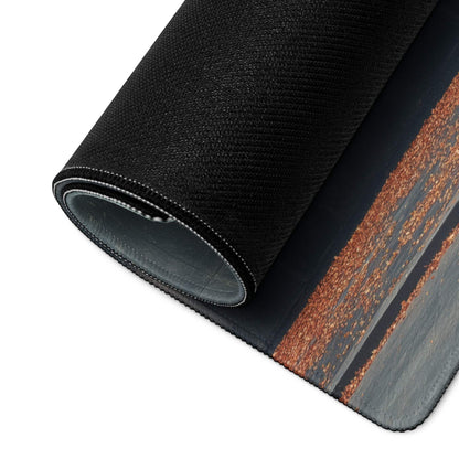 Back of black textured gaming mousepad with rusted metal design