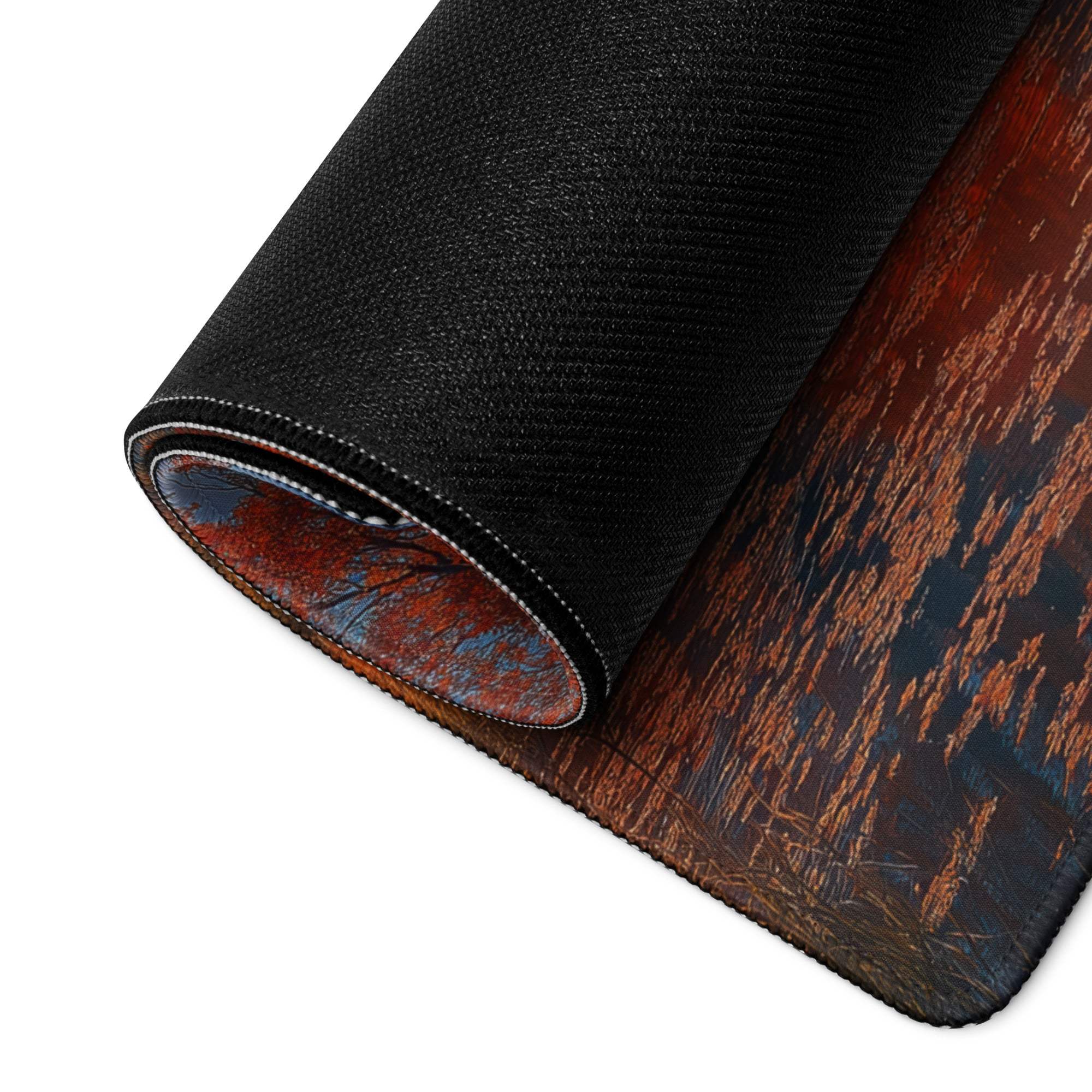 Black textured Autumn Sunset gaming mousepad with rolled edge forest scene