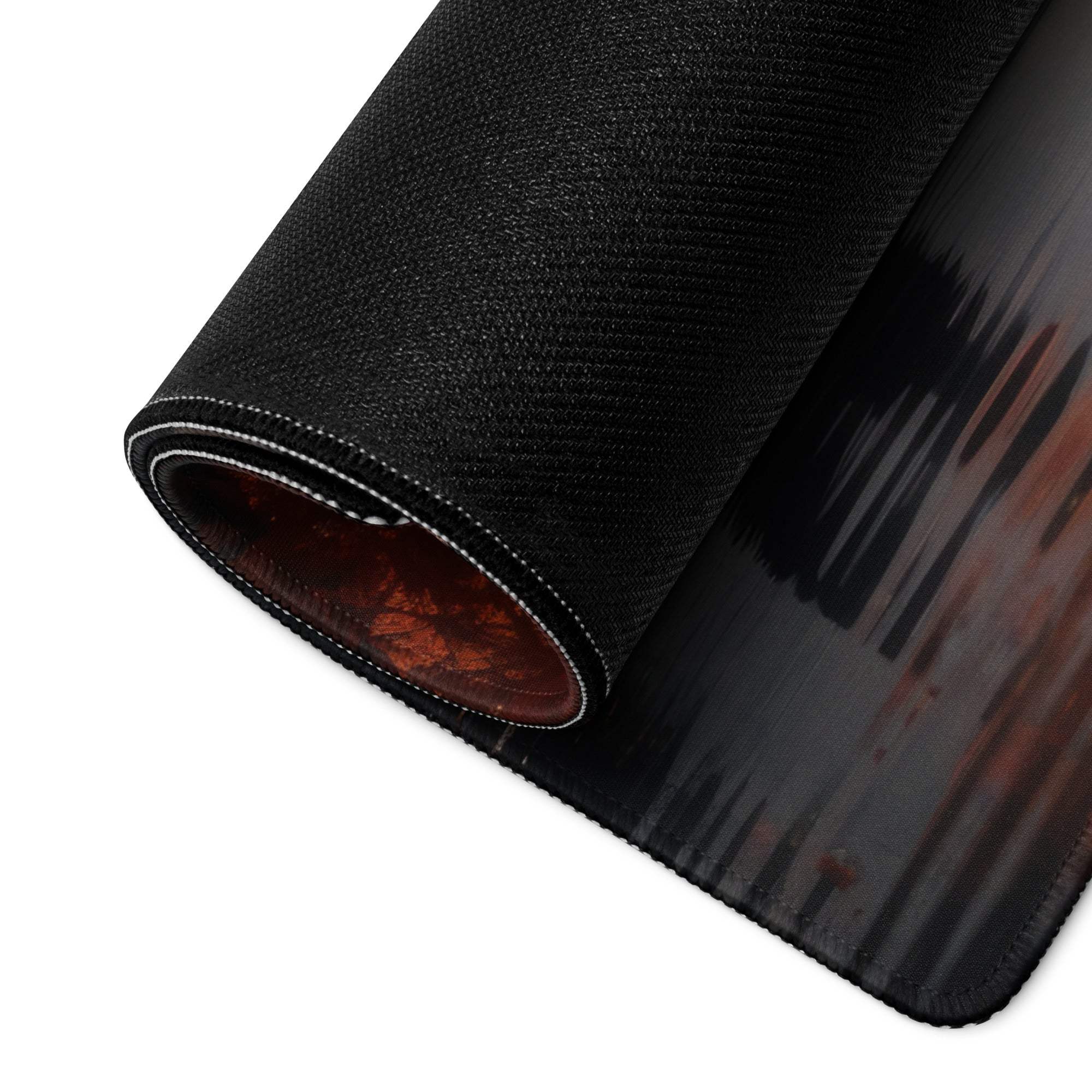 Rolled black textured mousepad with red-black gradient and stitched edge
