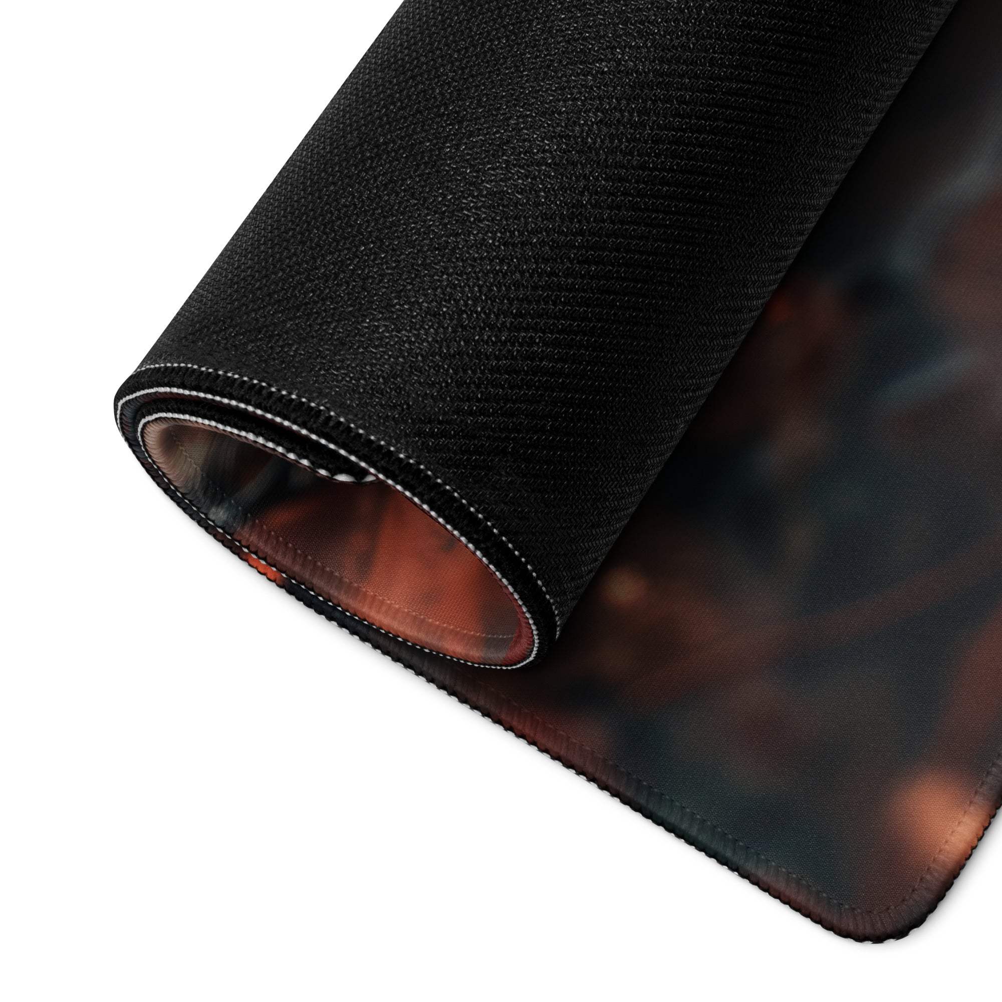Autumn Leaves large gaming mouse pad with black texture, rolled edge, white stitching, non-slip base, deep red and blue abstract design