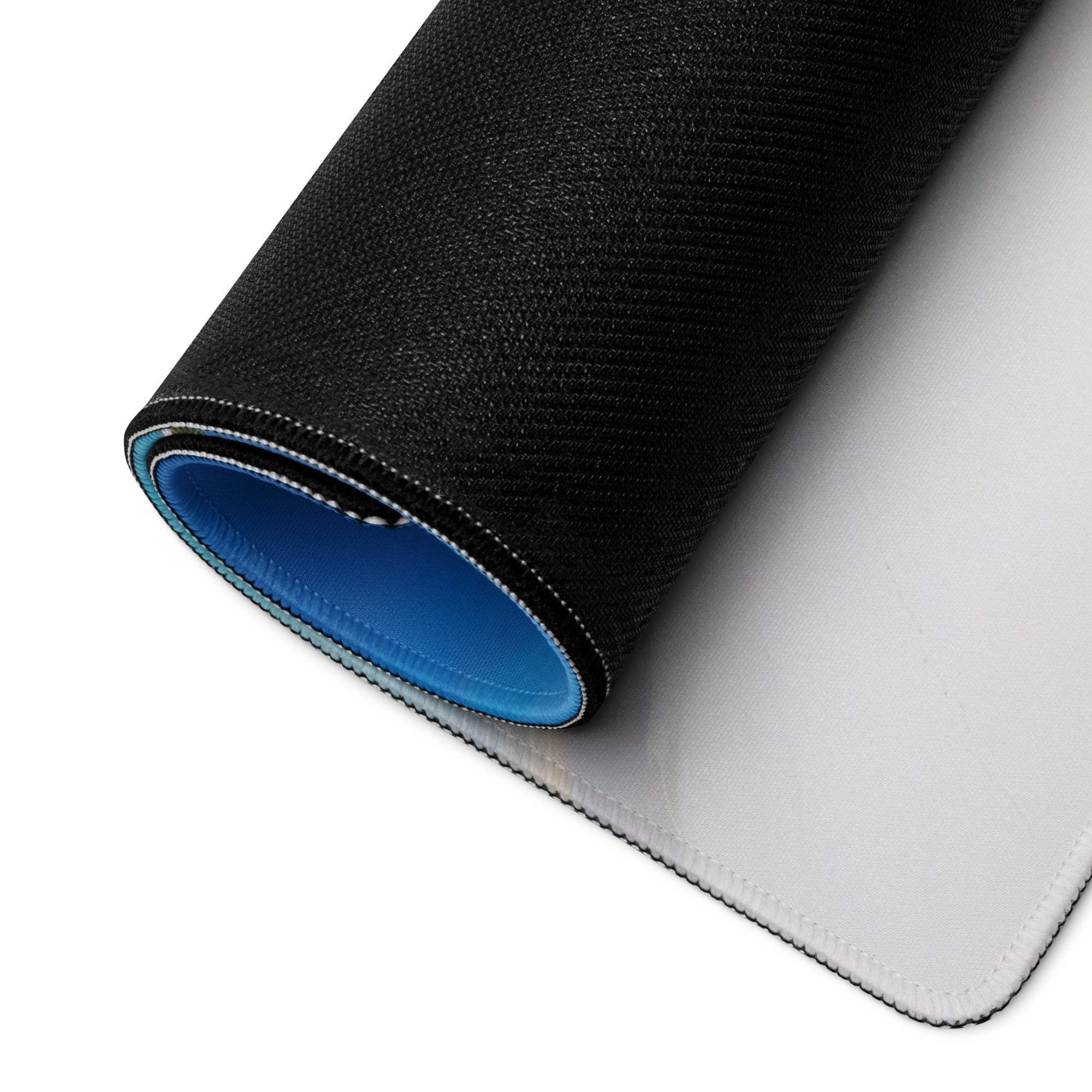 Black textured back of Vibrant Beach Paradise large gaming mousepad with blue lining