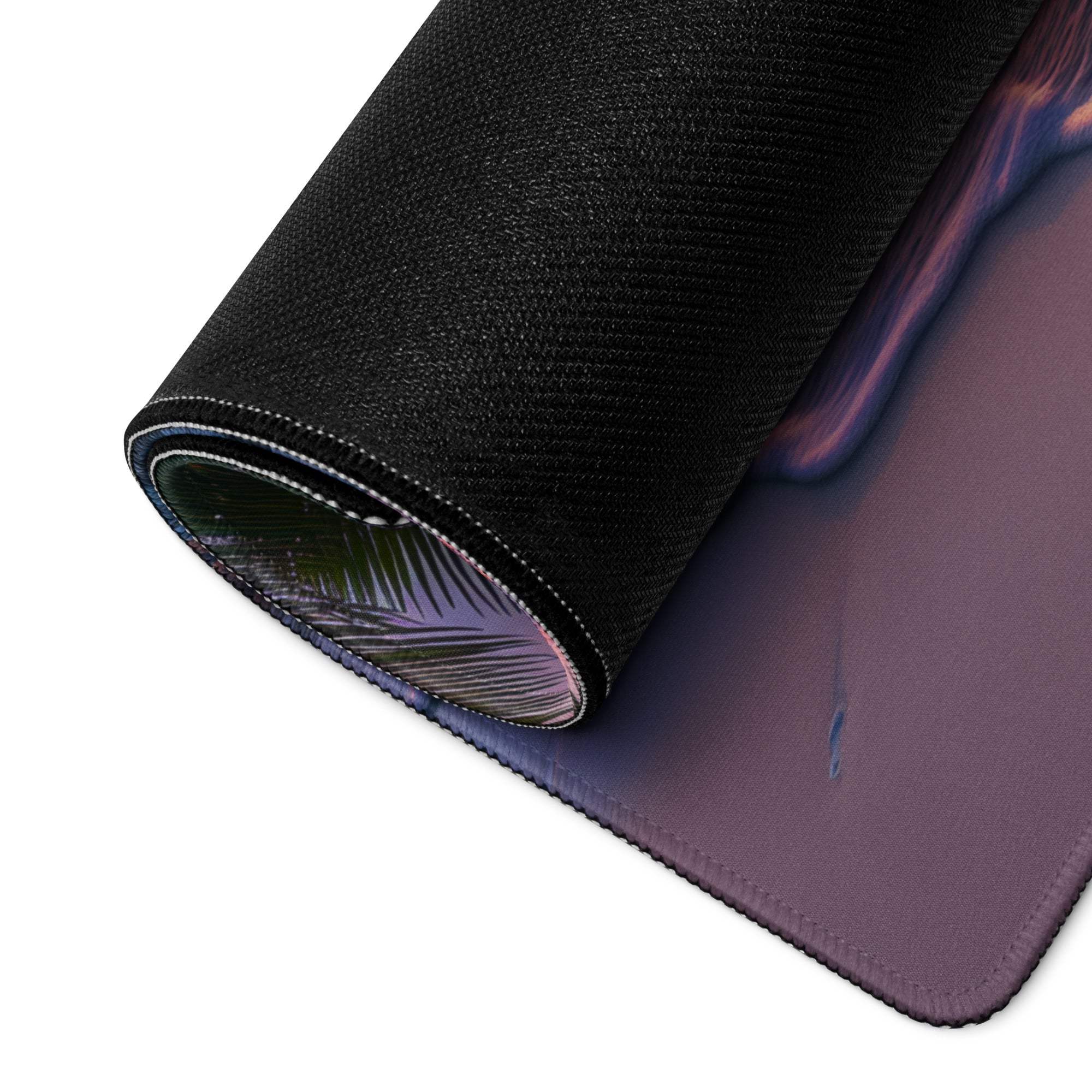 Rolled-up Vibrant Sunset Beach Gaming Mouse Pad with iridescent palm leaf design