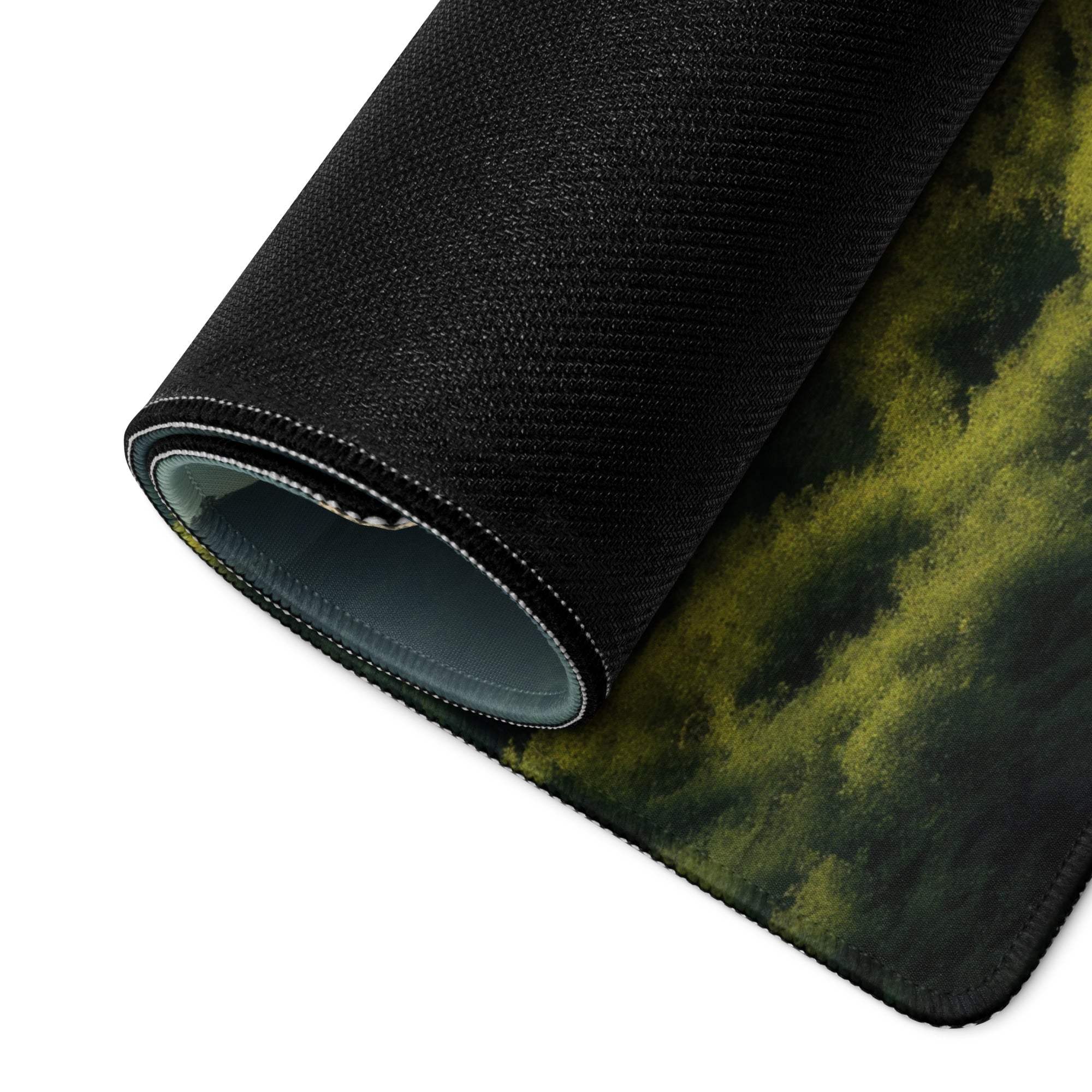 Black textured mousepad rolled edge reveals olive green forest design