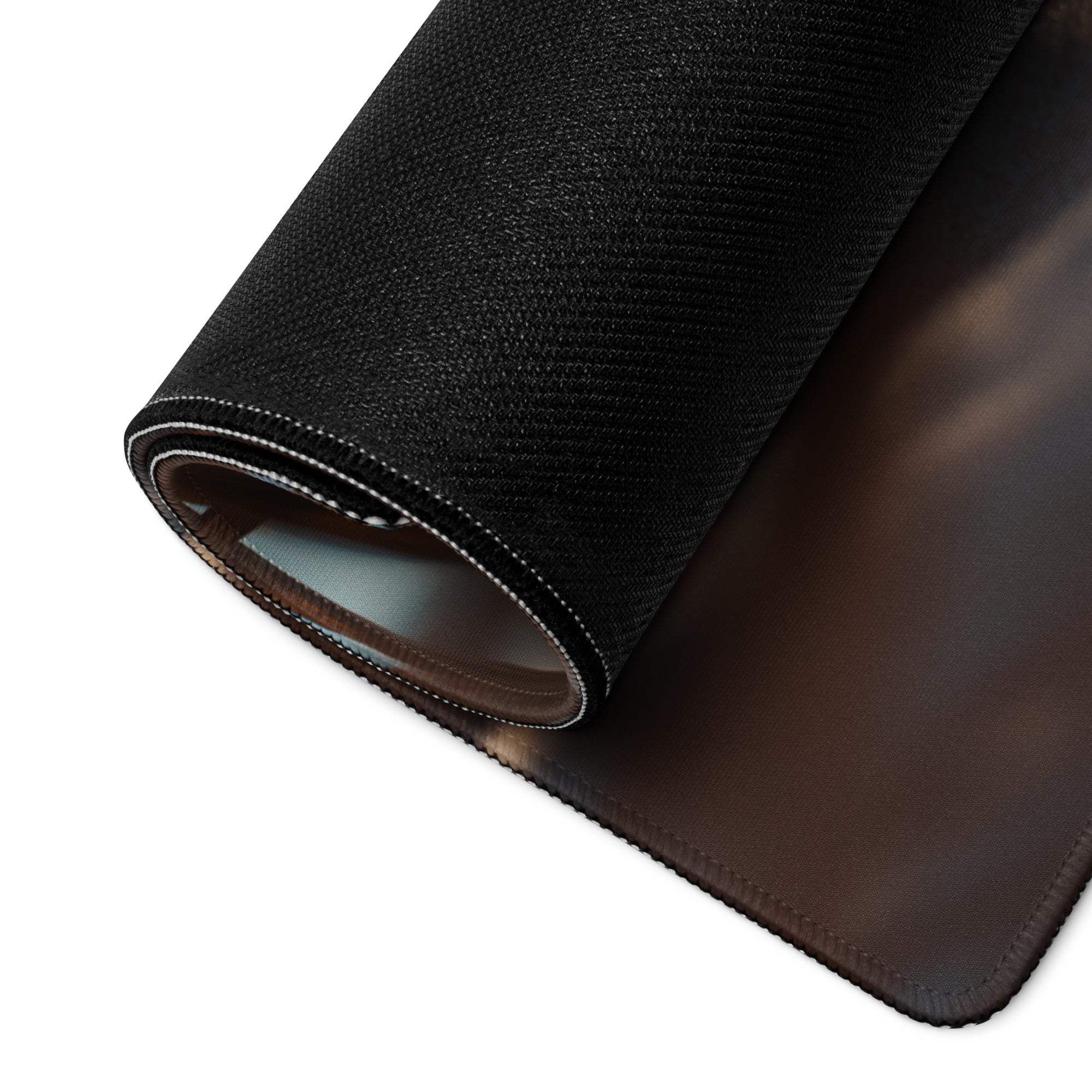 Back of Coastal Sunset Beach Vibe large gaming mouse pad with black textured top, brown leather-like underside, white edge stitching