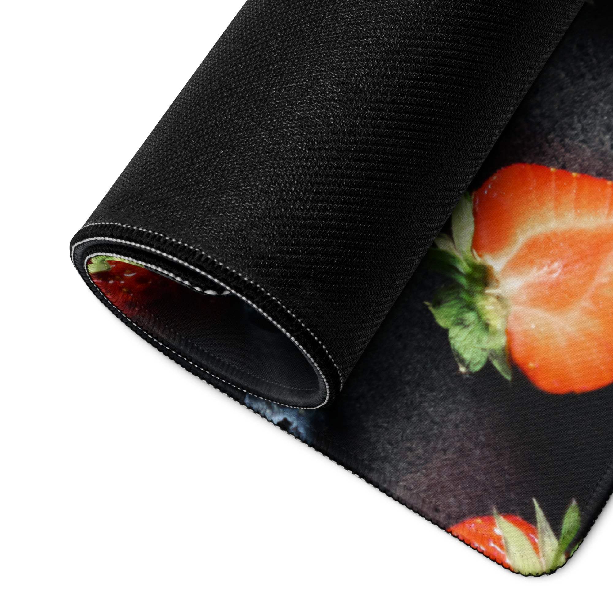 Large gaming mouse pad with sliced strawberries print and non-slip base