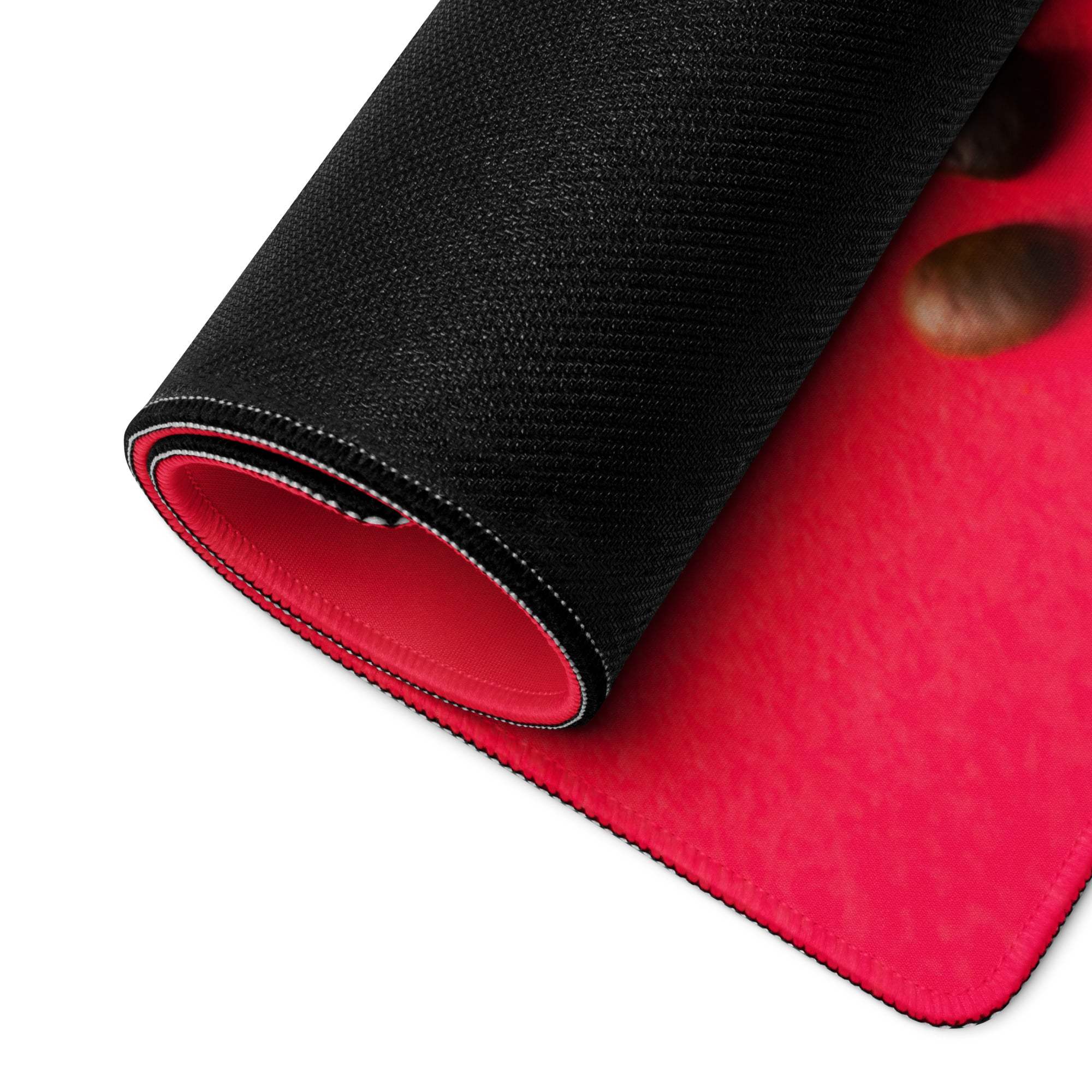 Bold red coffee bean gaming mousepad with textured surface, stitched edges, non-slip base