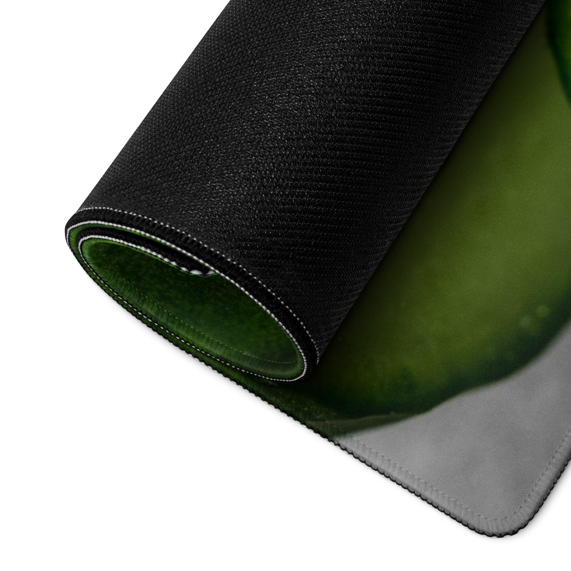 Black textured gaming mousepad with green gray cucumber design, rolled edge