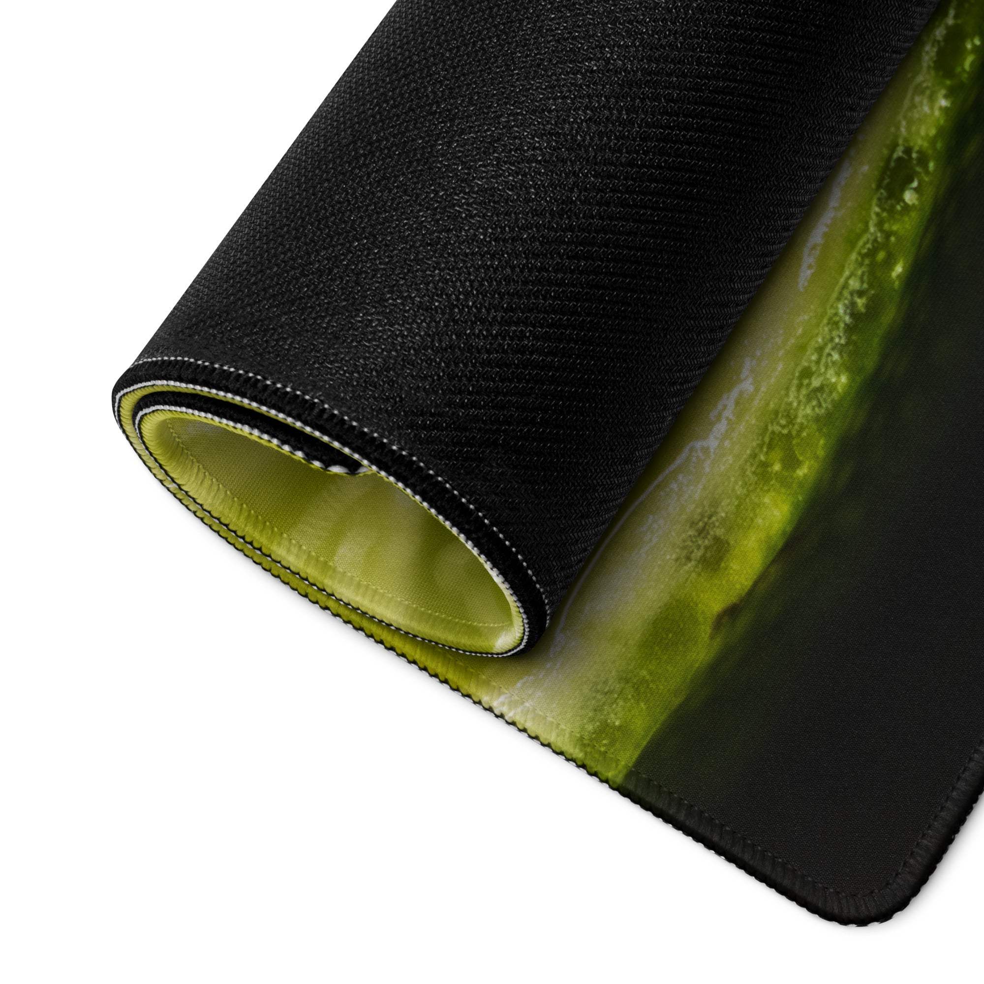 Black gaming mousepad with vibrant green textured top and lime-green lining