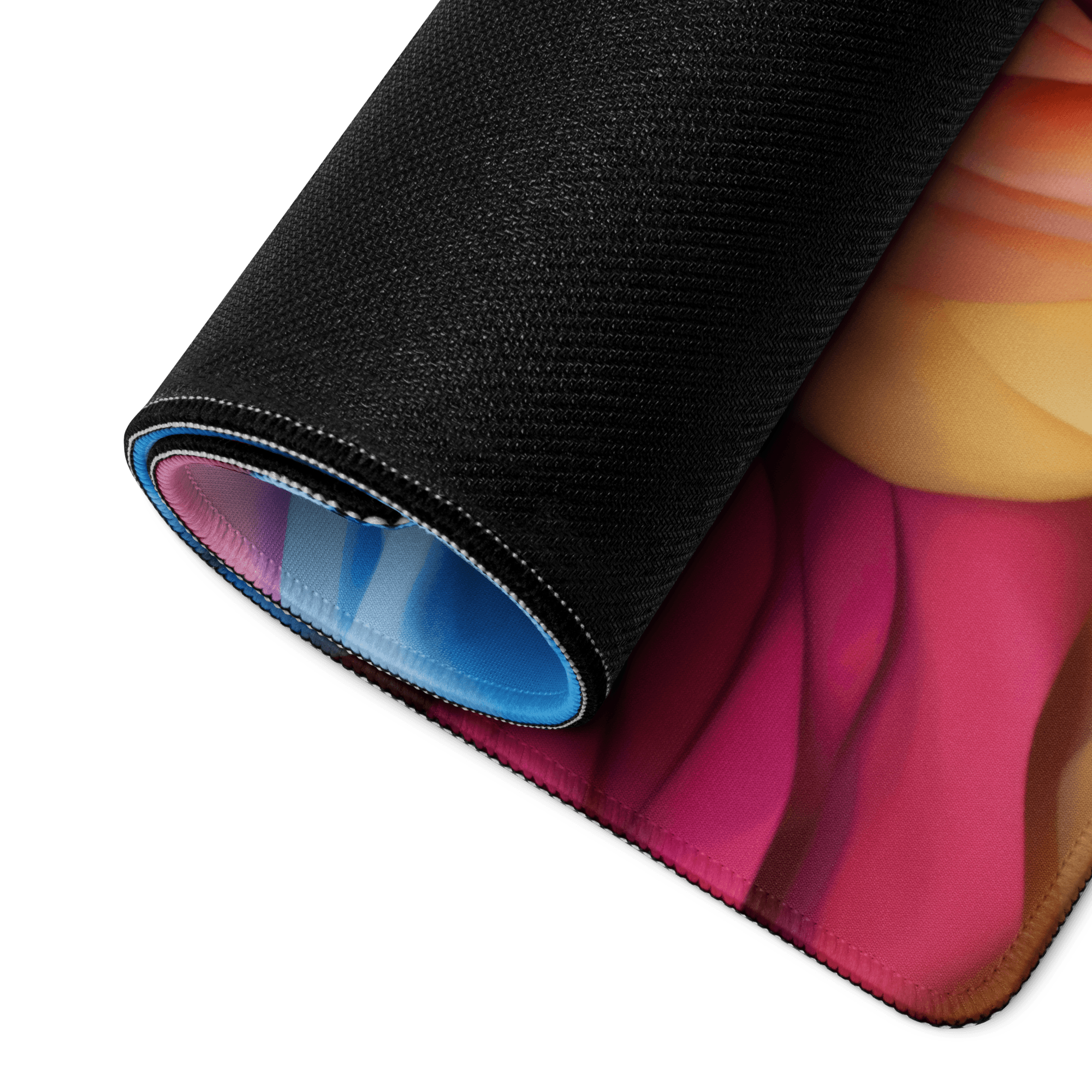 Rolled-up Vibrant Floral Rainbow Gaming Mouse Pad with pink-orange-blue gradient