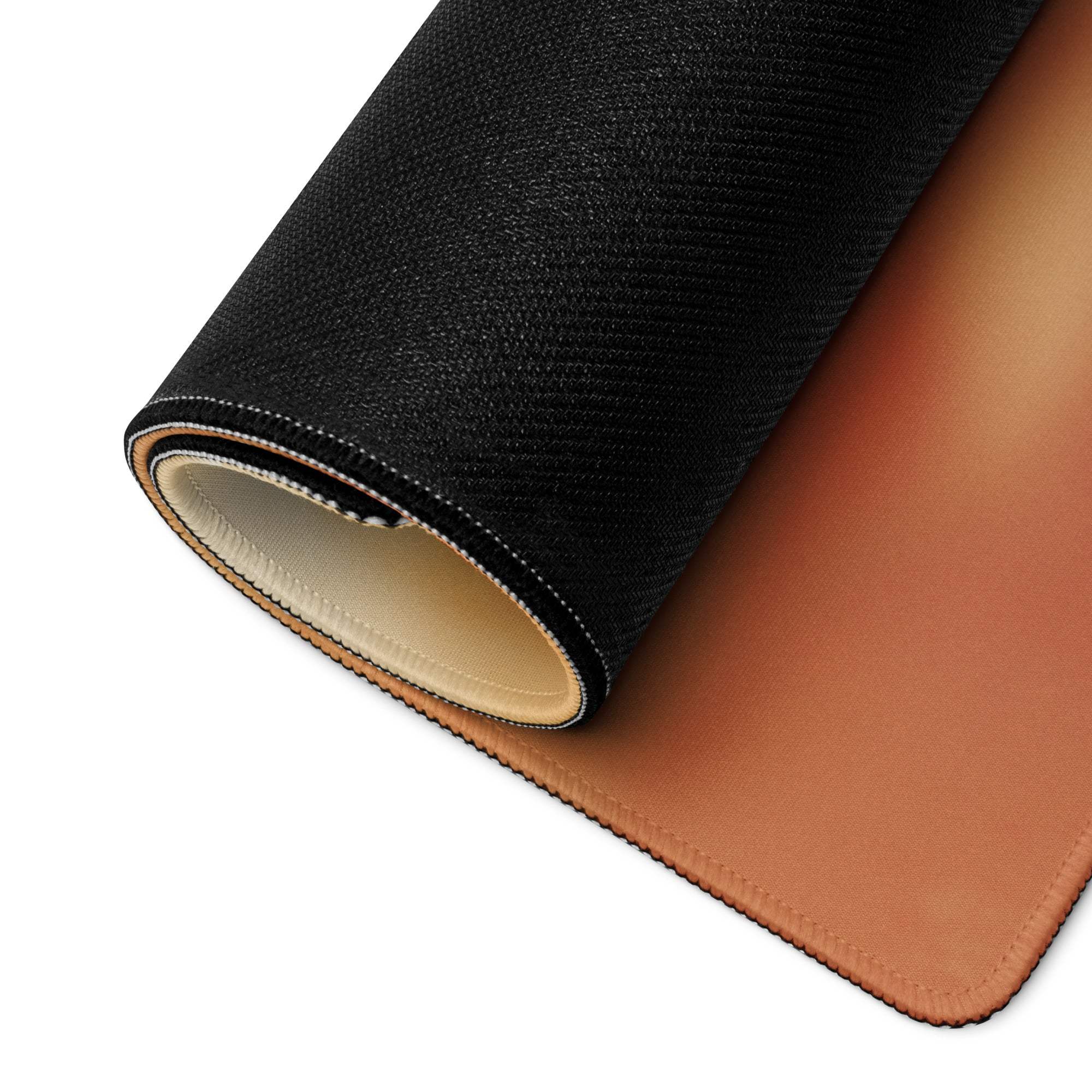 Black textured back with tan leather interior, rolled to show layers on Romantic Peach Rose mouse pad