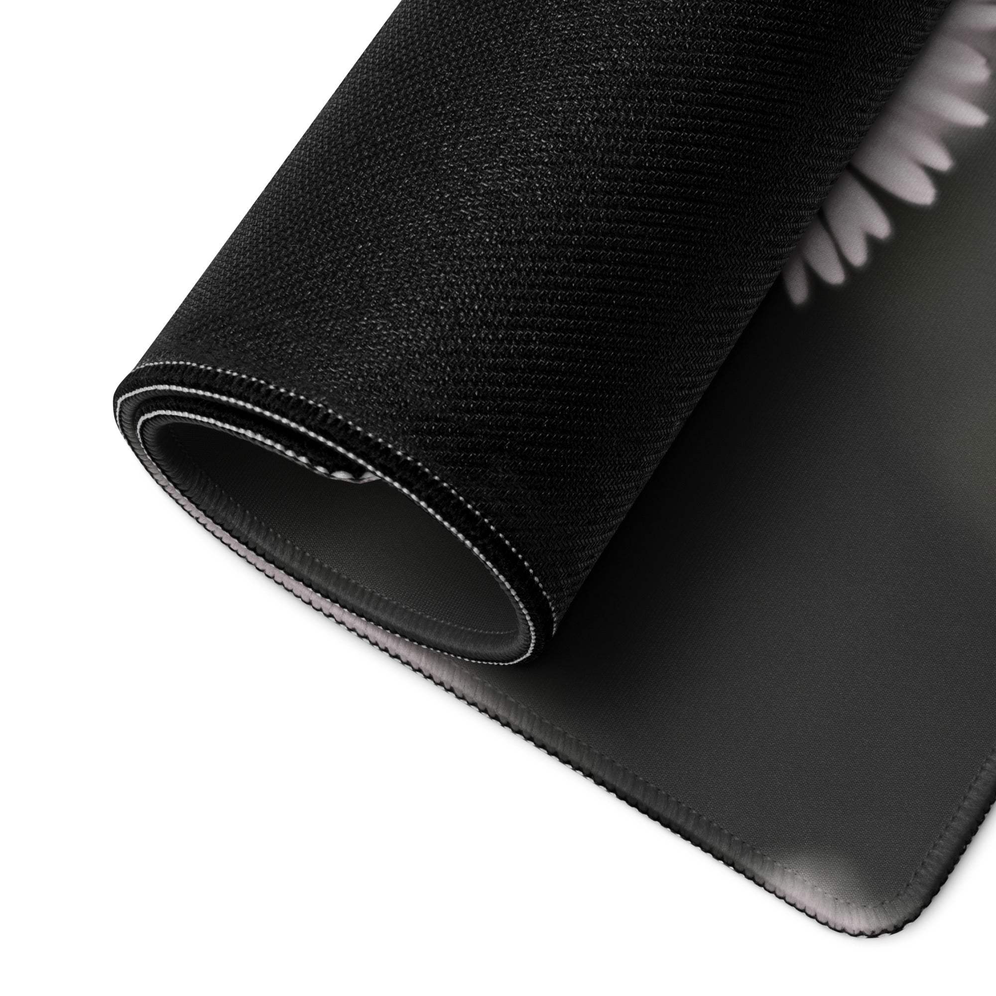 Black textured gaming mousepad with white feather edge and daisy field design
