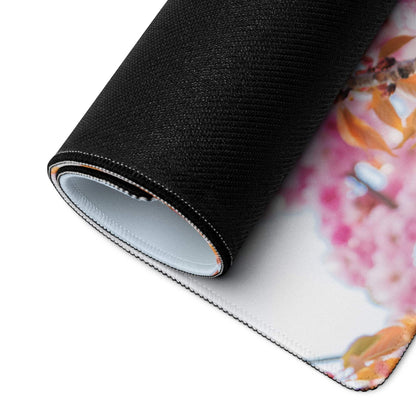 Rolled-up Floral Pink Blossom extra large gaming mouse pad with vibrant floral design