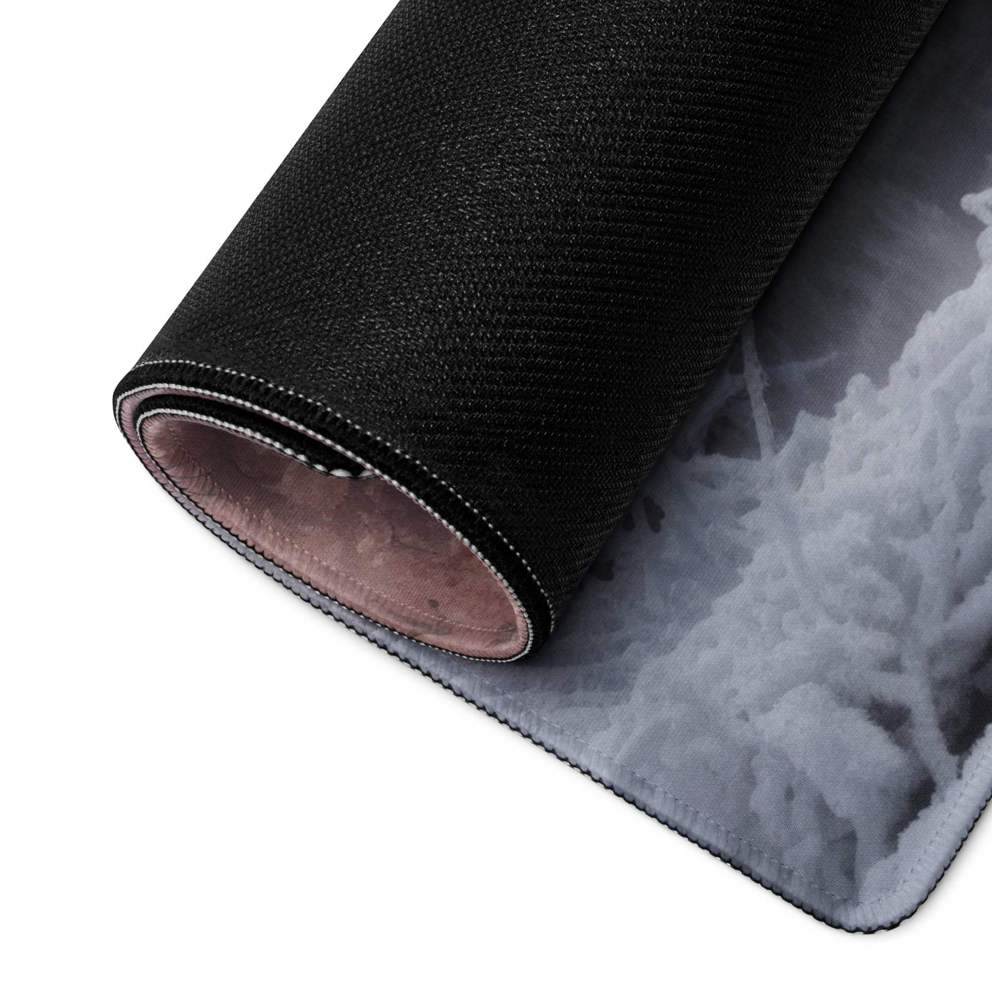 Black textured mousepad with gray white cloud design surface