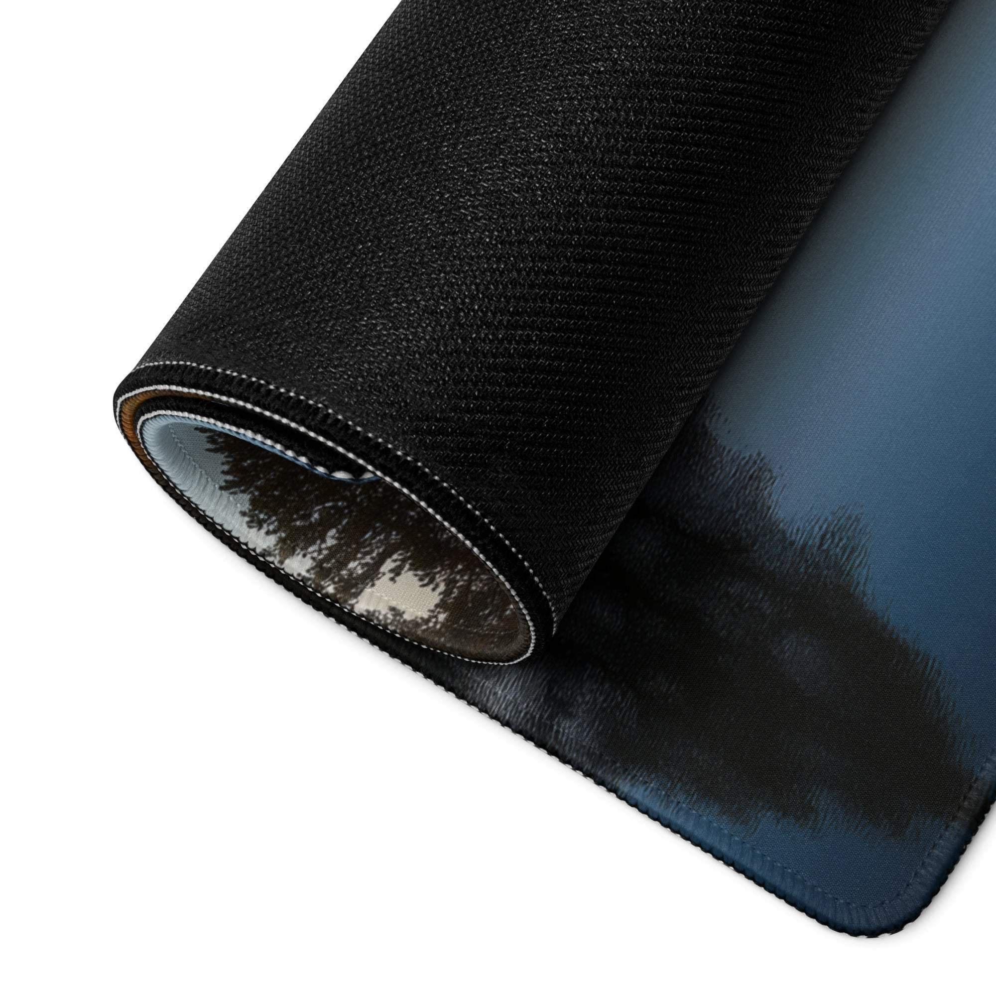 Black textured Autumn Forest gaming mouse pad with non-slip base