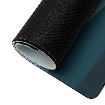 Black textured mousepad with teal gradient, white lining, non-slip base