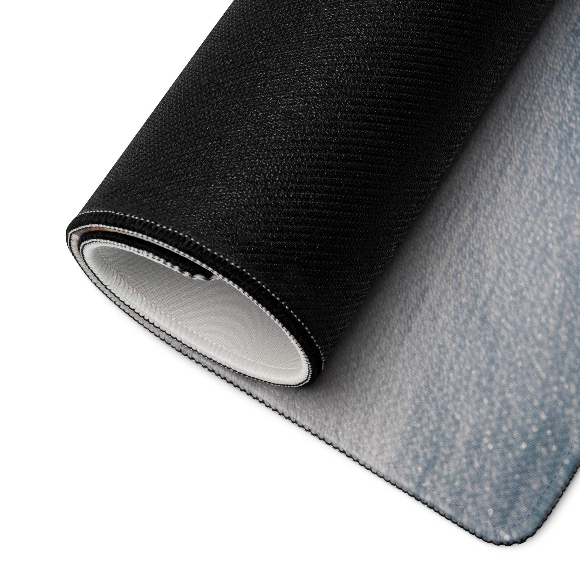 Black textured gaming mousepad with gray gradient, white stitched edges
