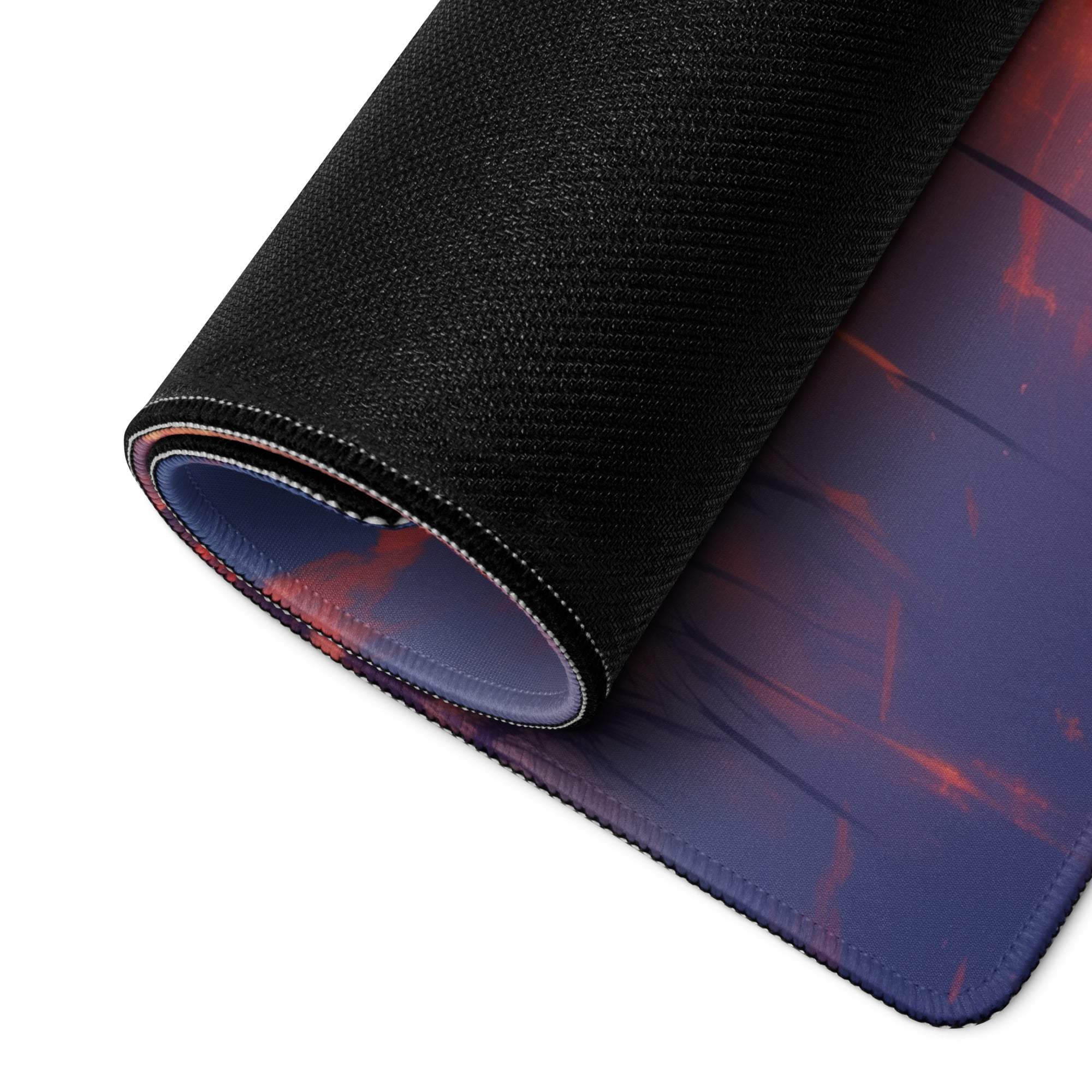 Rolled-up Sunset Tree gaming mouse pad with dark textured back