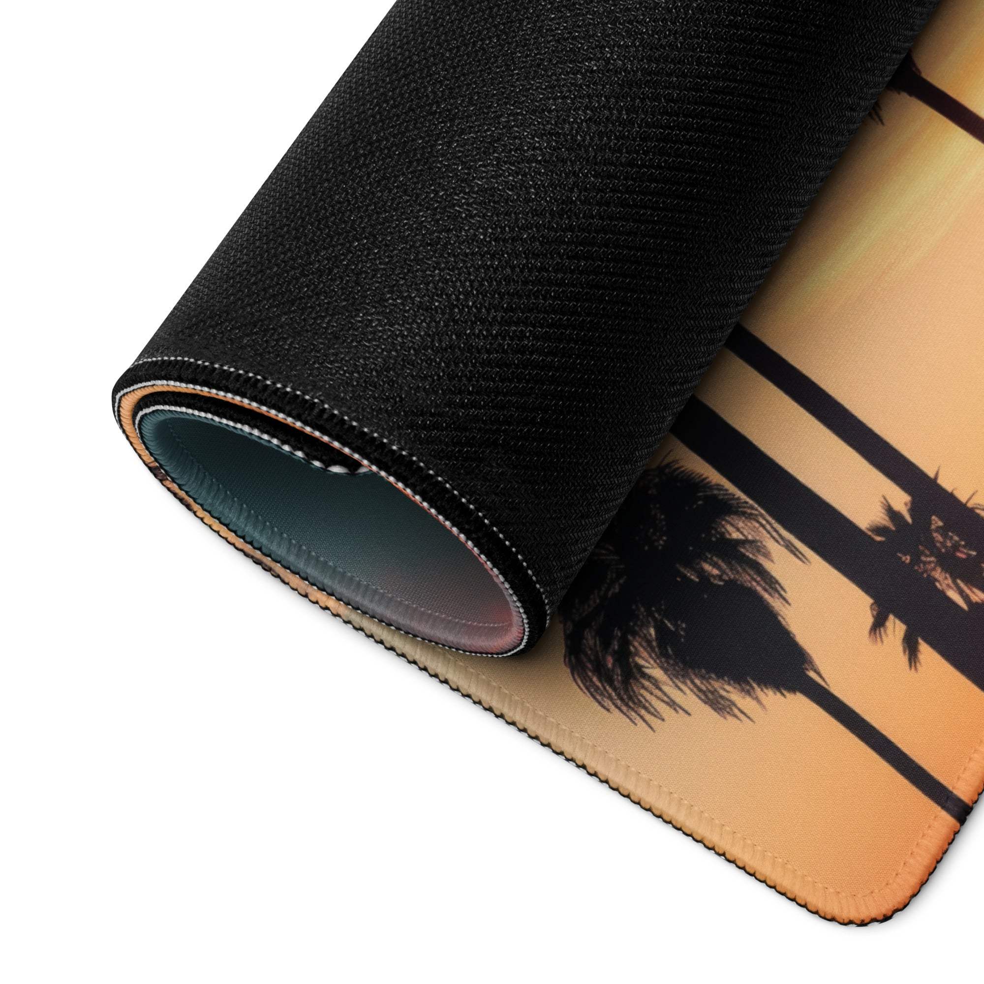 Rolled-up Vibrant Sunset Palm Trees gaming mouse pad with non-slip base