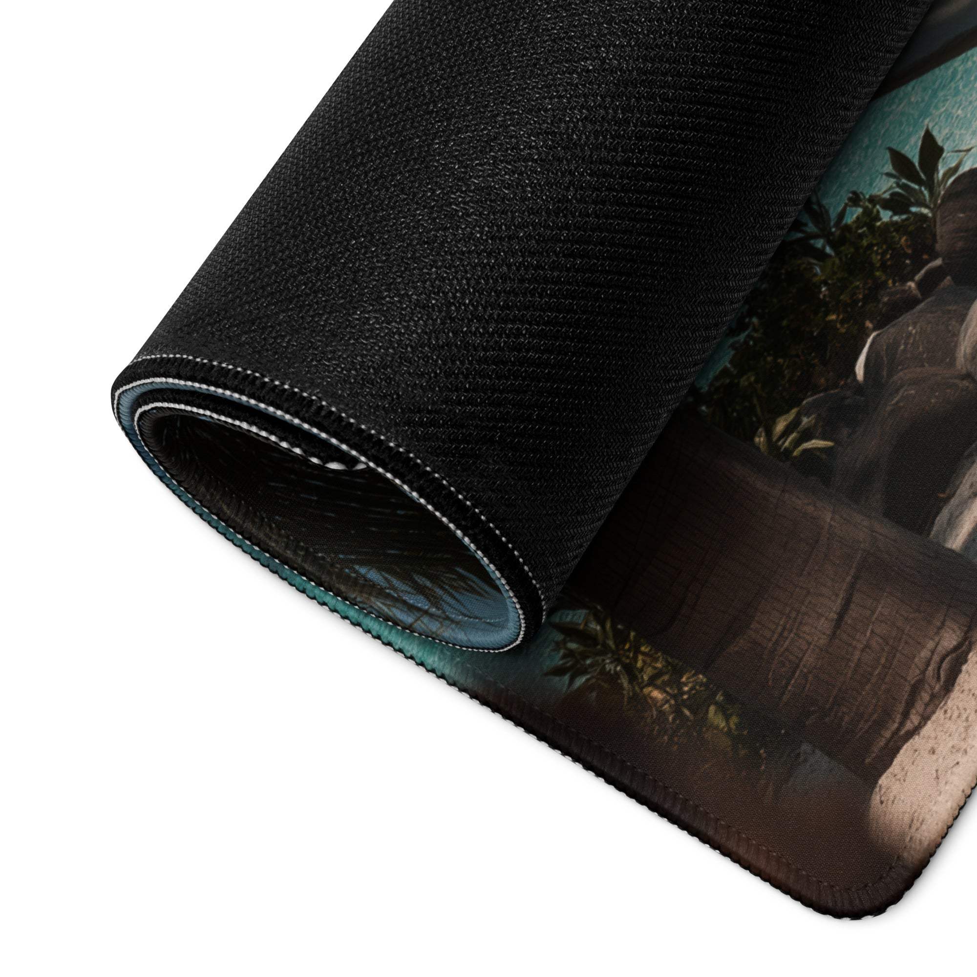 Black textured mousepad with rolled edge and ancient ruins in lush greenery
