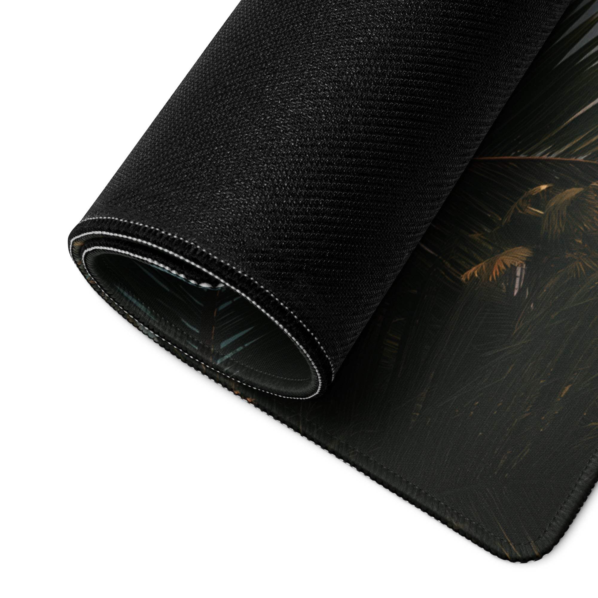 Black textured tropical leaf mousepad with gold stitched edge