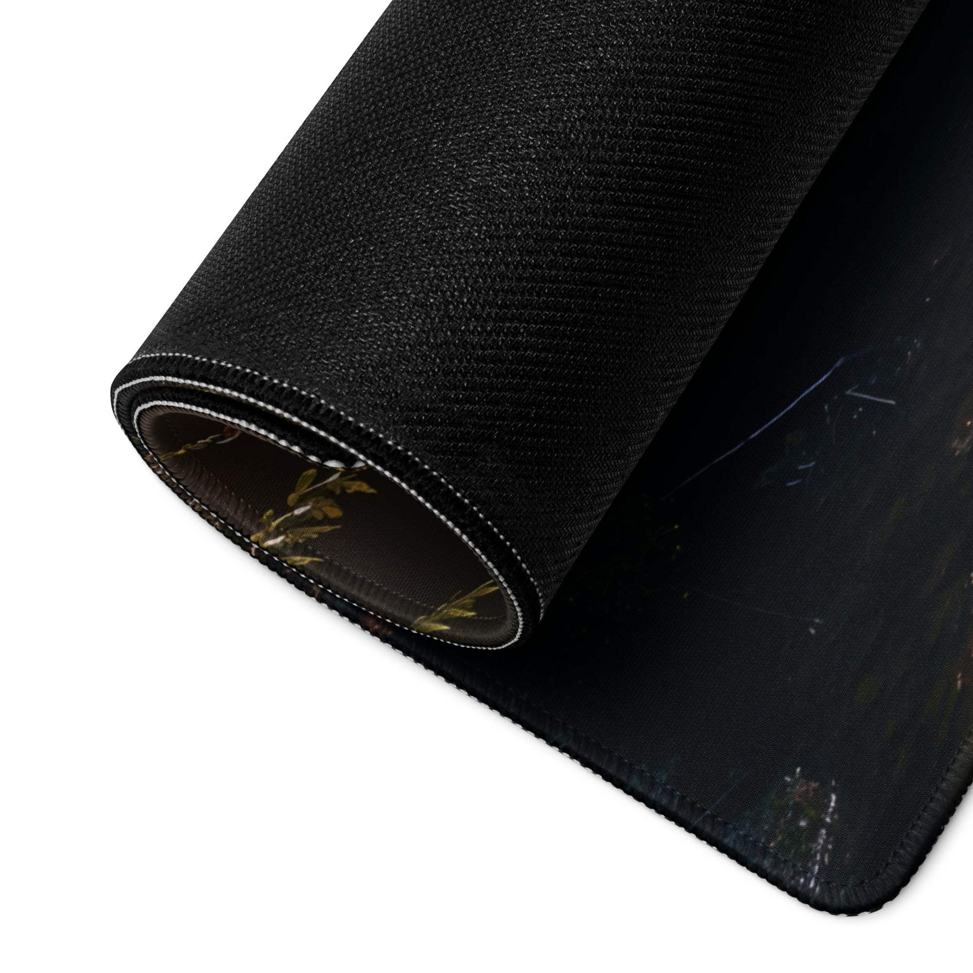 Black textured Golden Hour Forest gaming mousepad with subtle botanical rolled edge