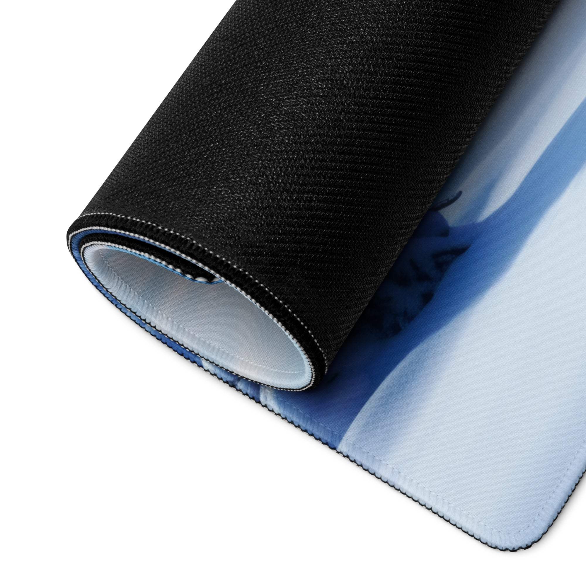 Epic Winter Blue Snow Landscape gaming mousepad with black-blue gradient, textured surface, stitched edges, large non-slip base