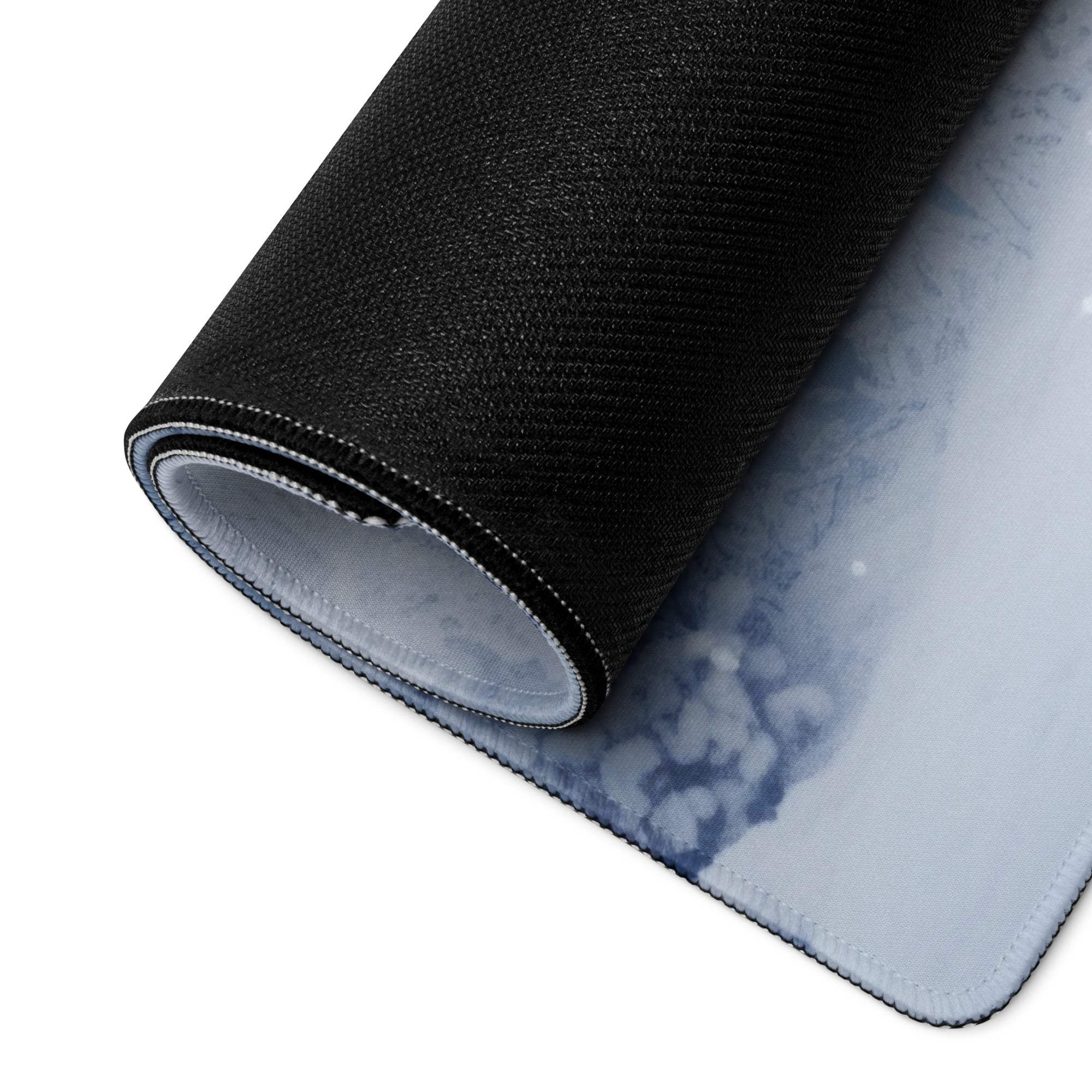 Black textured Frosty Blue Winter Forest gaming mousepad unrolled side