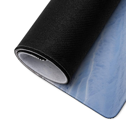 Back of Serene Winter Forest Snowy Blue gaming mouse pad with black textured top and light blue gradient underside