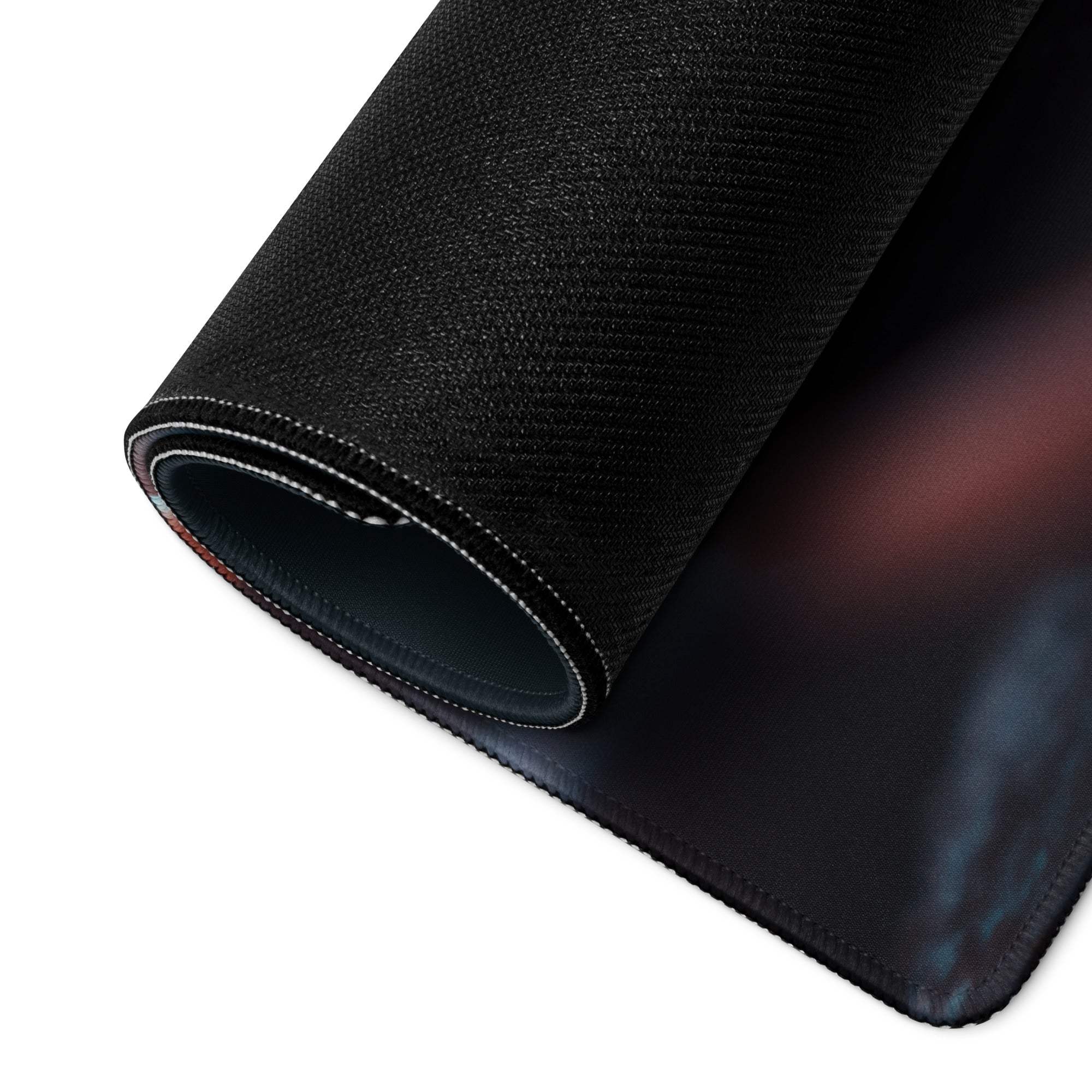 Black textured gaming mousepad with moody blue red spiked motif gradient edge