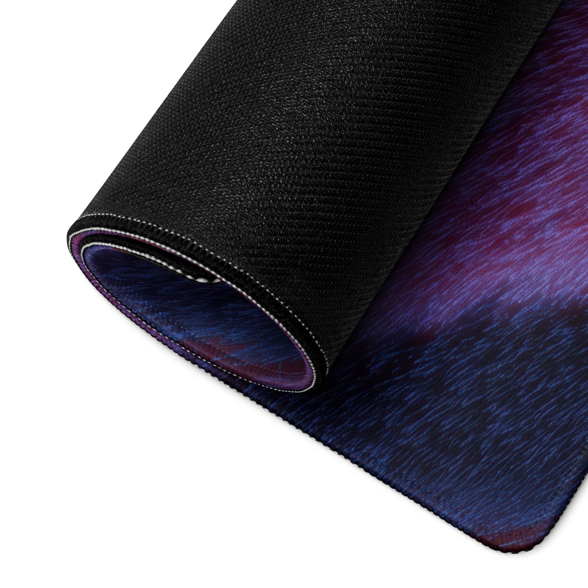 Black textured gaming mousepad with vibrant purple blue feather gradient