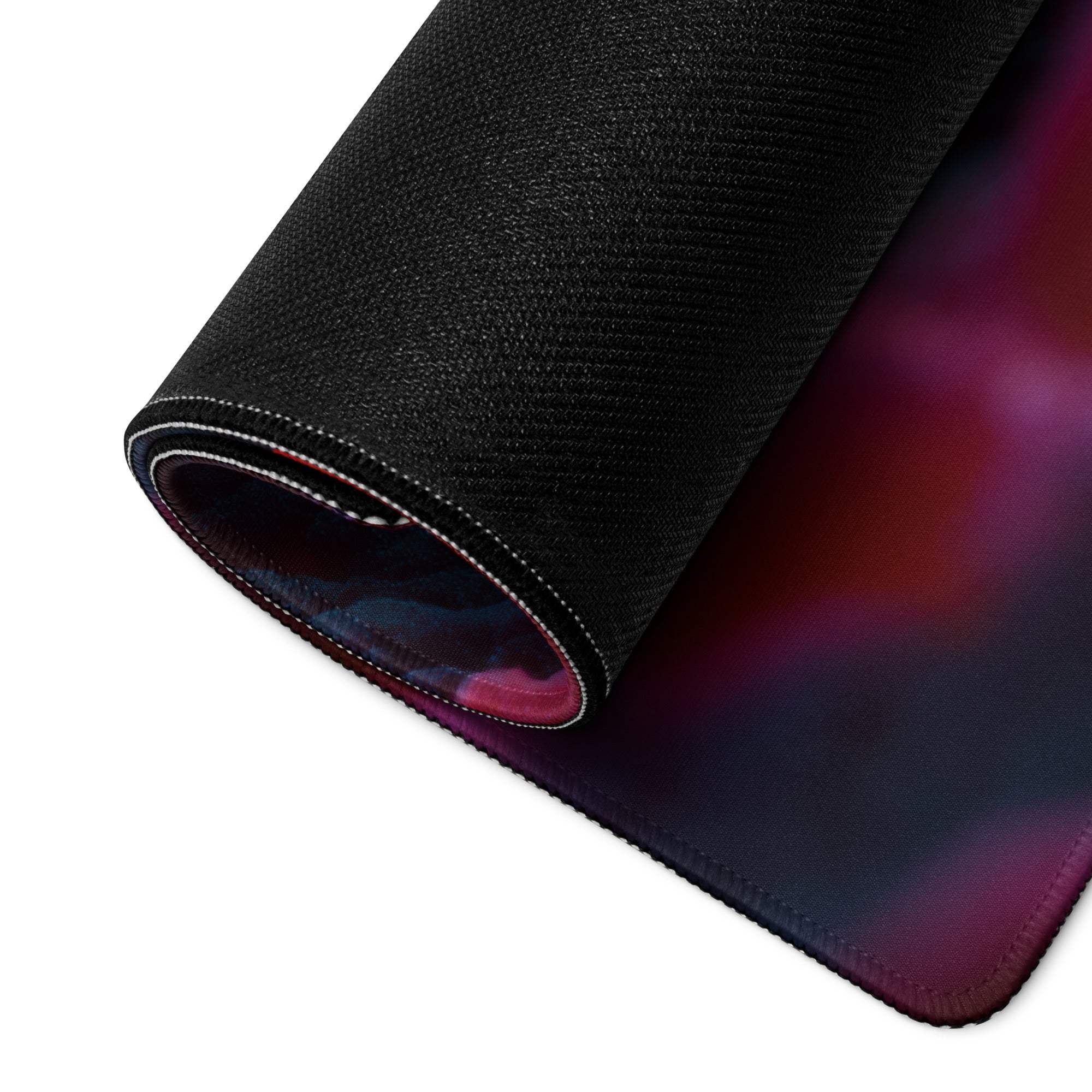 Large non-slip gaming mouse pad with vibrant purple-red gradient texture