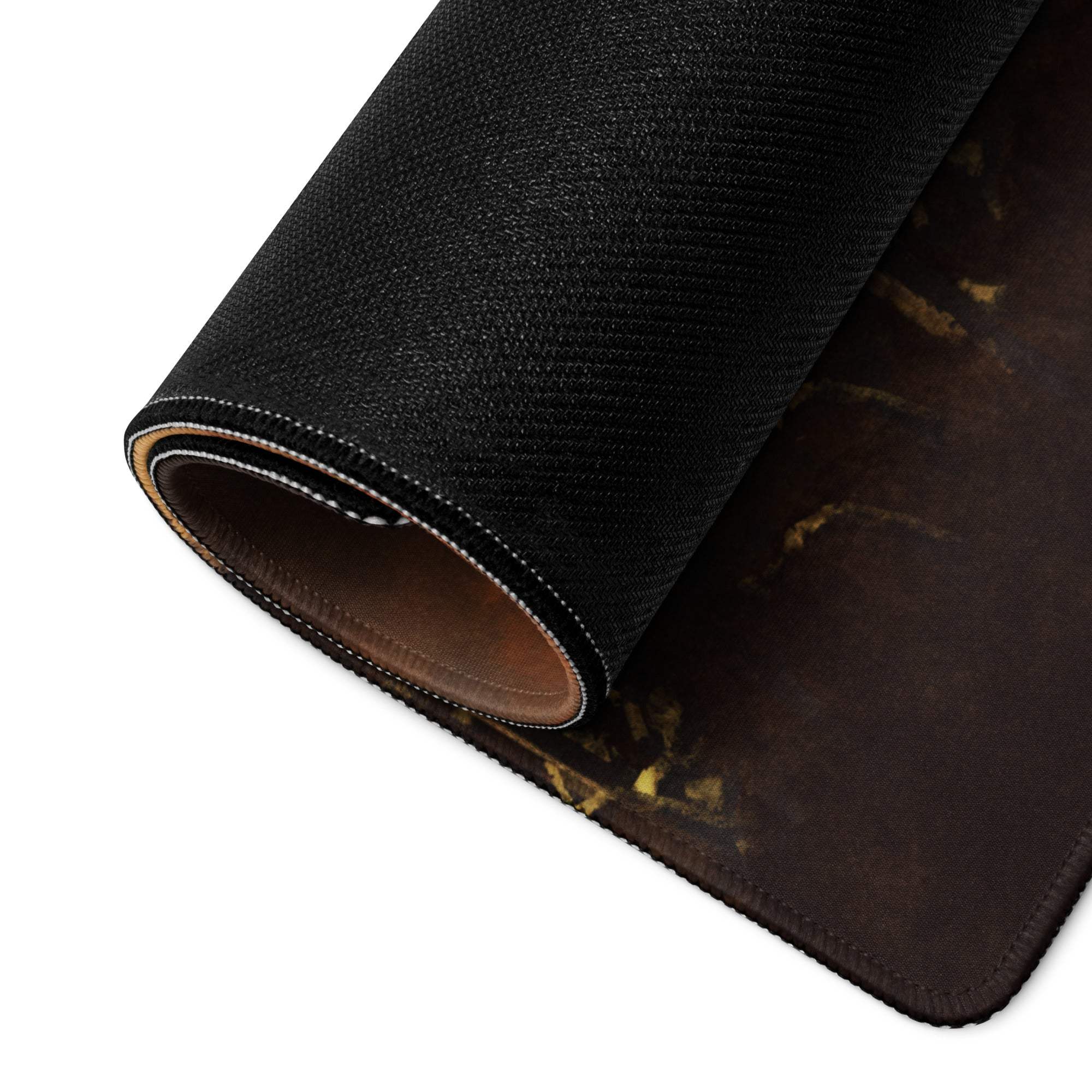 Crimson War Dawn gaming mouse pad with black textured surface, gold marbled pattern, and brown leather-like underside