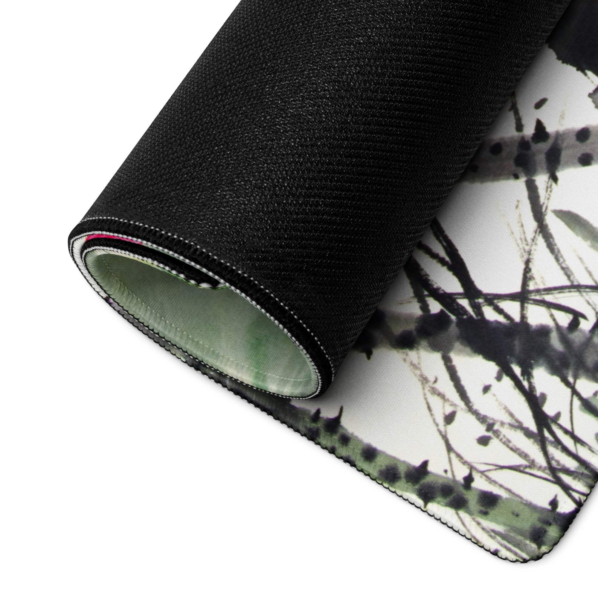 Black and white ink-style branch design mousepad with textured fabric surface for calm zen aesthetic desktop use