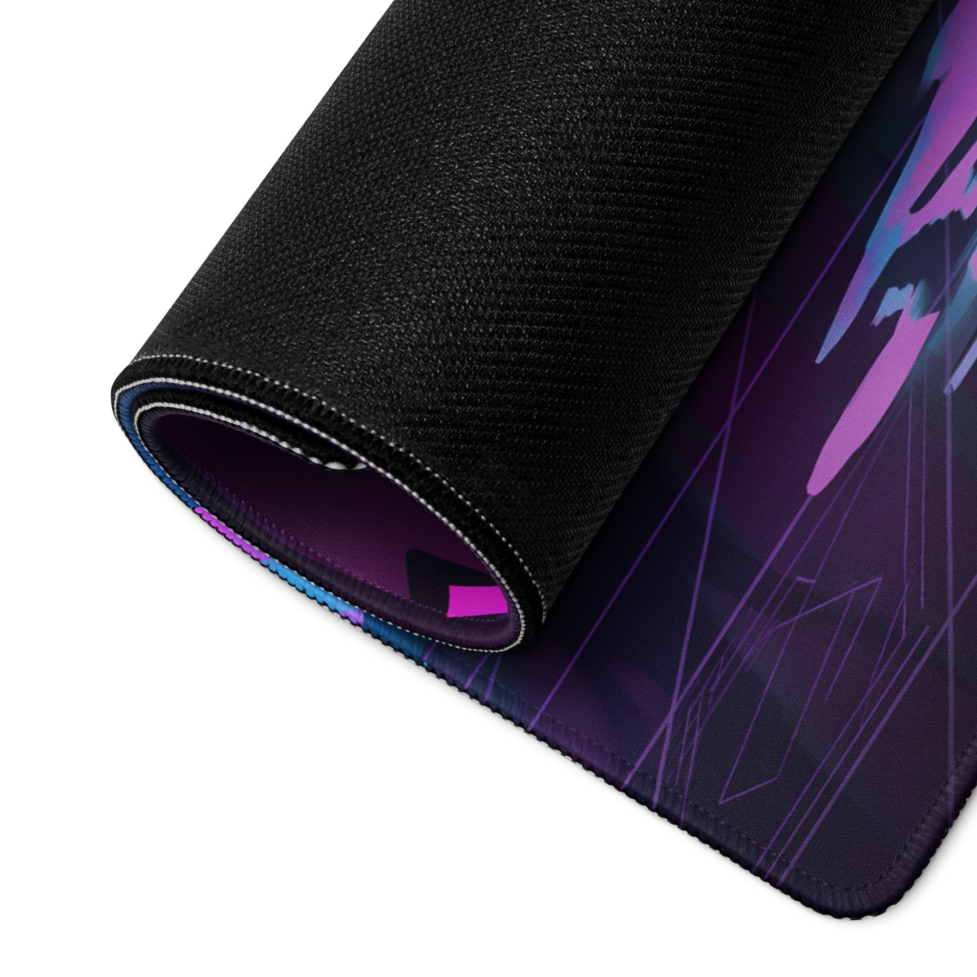 A rolled-up black gaming mousepad with a vibrant purple and blue neon vaporwave dragon design for desk use