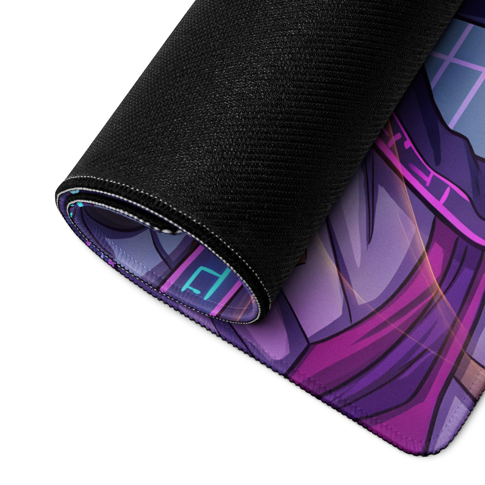 A rolled-up purple and black vaporwave neon mage gaming mouse pad with textured fabric surface and non slip backing