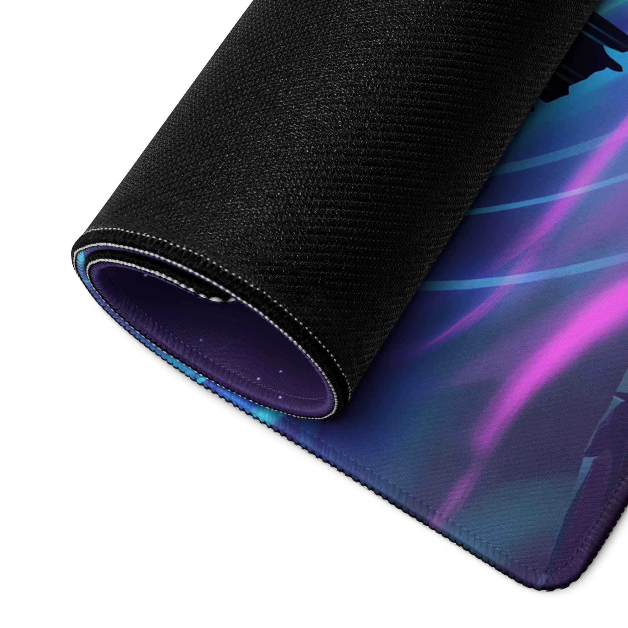 A rolled-up vaporwave neon gaming mouse pad with vibrant purple and blue glowing design for gaming desks