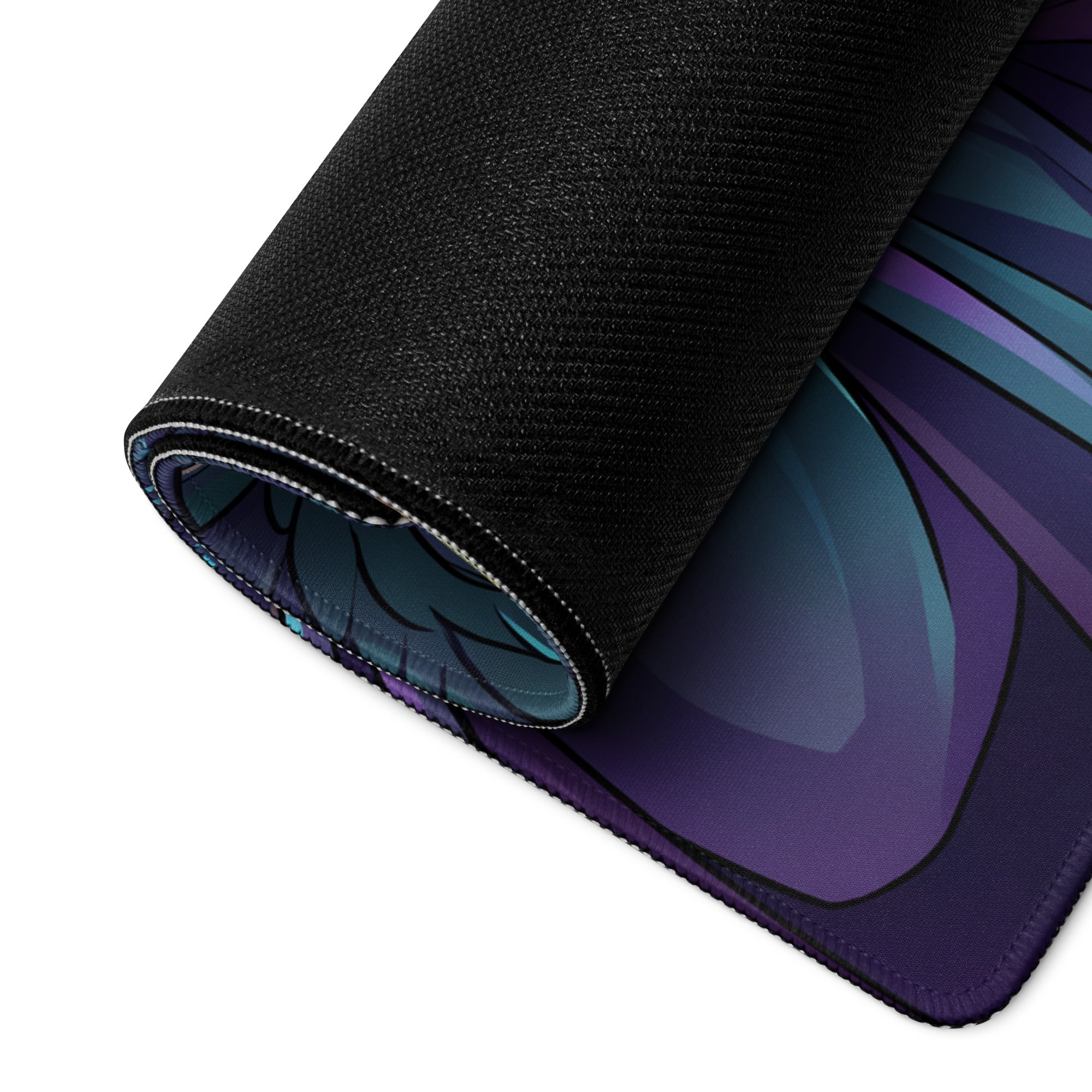 Rolled-up black gaming mousepad with vibrant purple and teal anime-style wing design for vaporwave desk setup