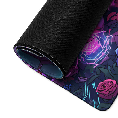 Rolled-up black gaming mousepad with vibrant neon rose design in purple pink and blue for vaporwave desk setup