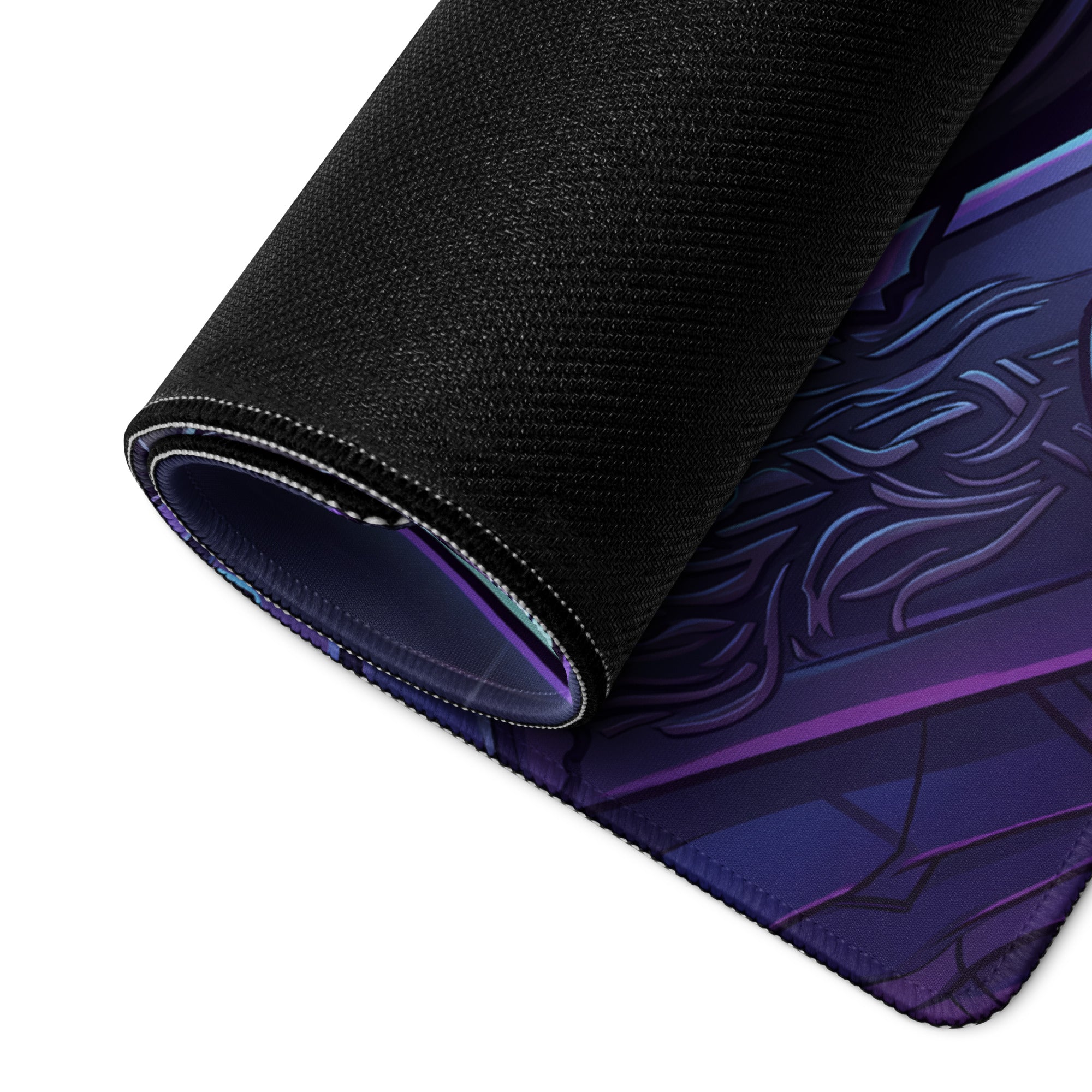 A rolled-up black gaming mousepad with vibrant purple and blue neon vaporwave fantasy glowing patterns