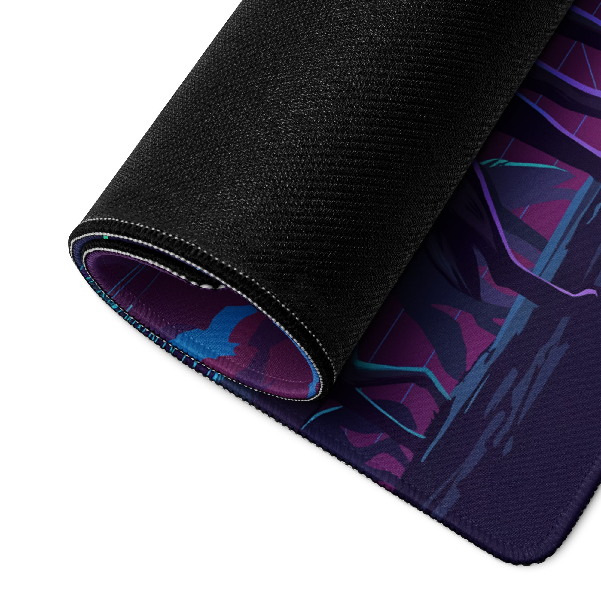 Rolled-up black gaming mousepad with purple and teal vaporwave wolf anime-style design for retro futurism setup