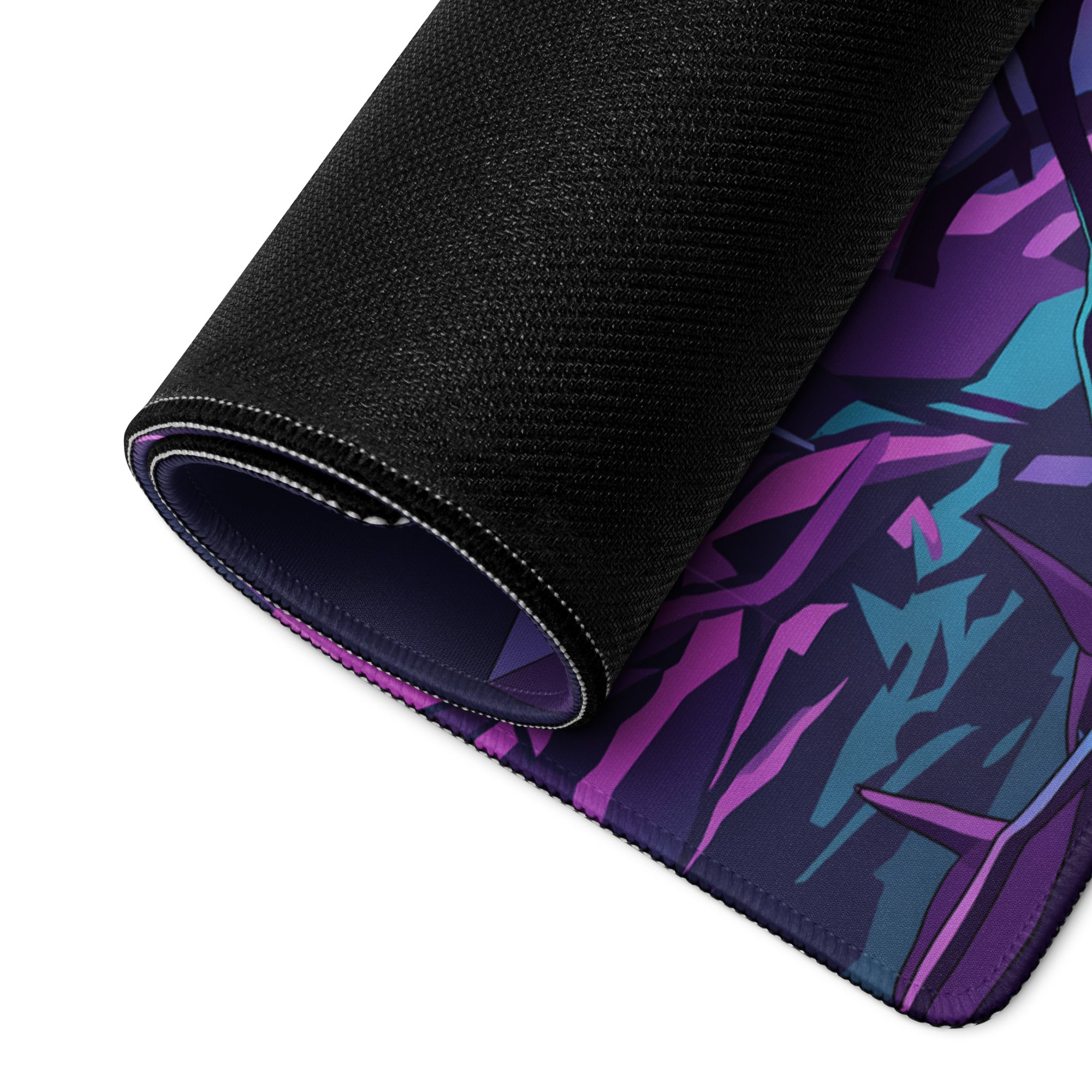 A rolled-up neon vaporwave mouse pad with vibrant purple and teal abstract design and black textured outer layer