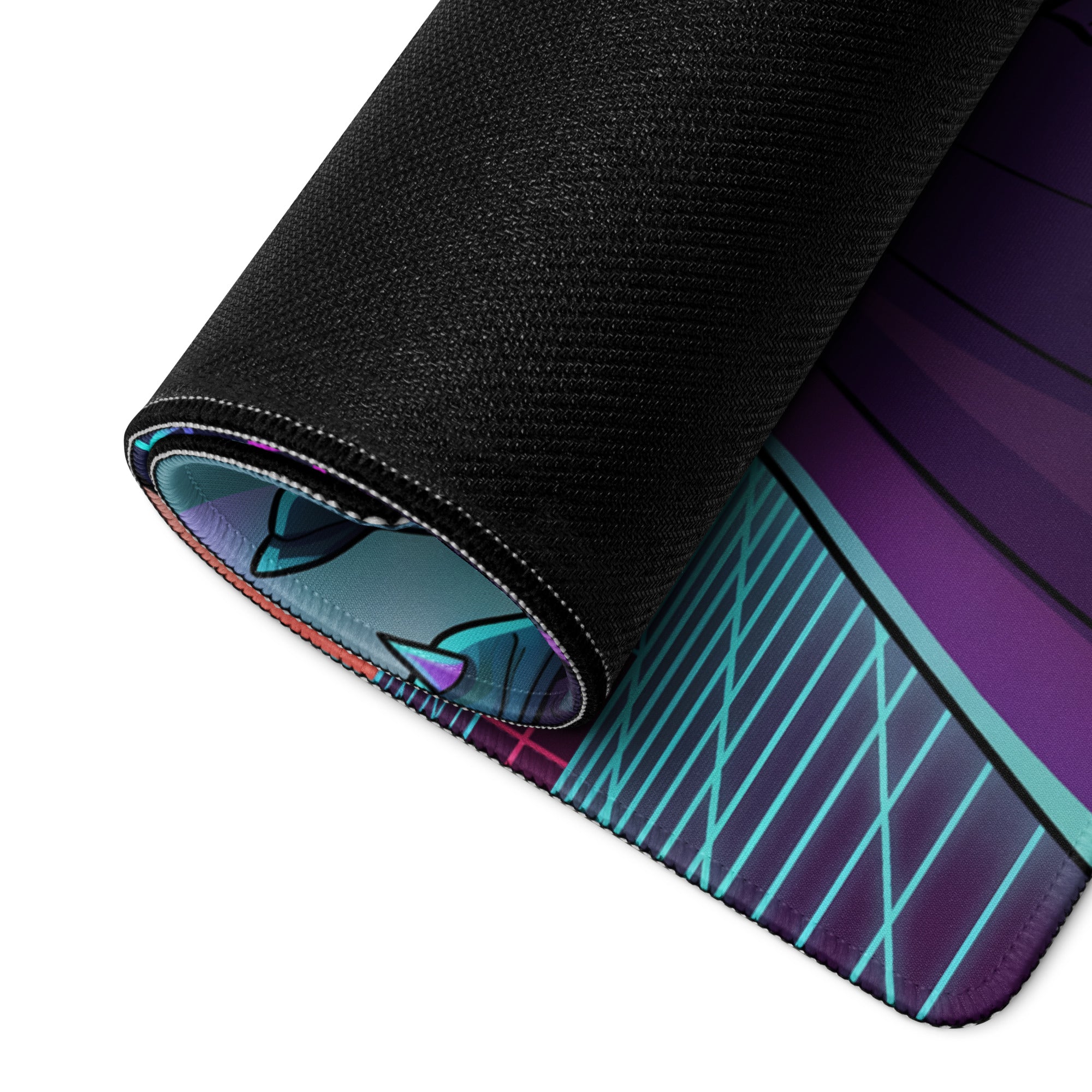 A rolled-up neon dragon vaporwave mouse pad with vibrant purple teal geometric design and cartoon cat ears in black fabric