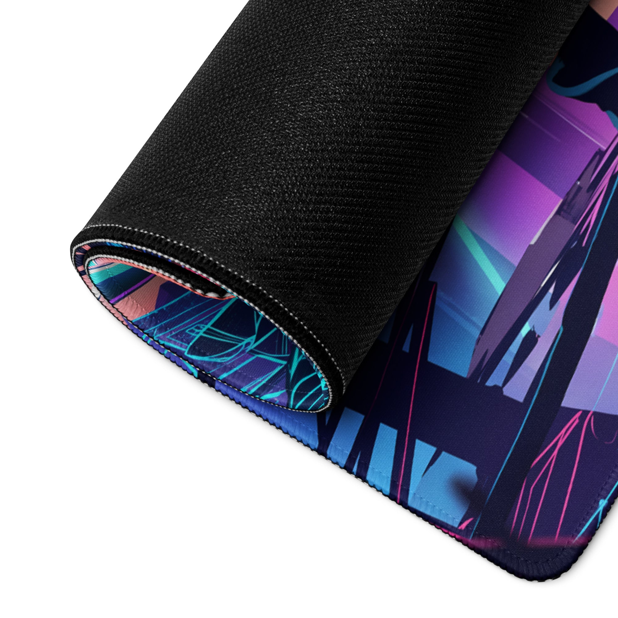 Rolled-up vaporwave neon city gaming mousepad with vibrant purple blue pink cyberpunk design on black textured surface