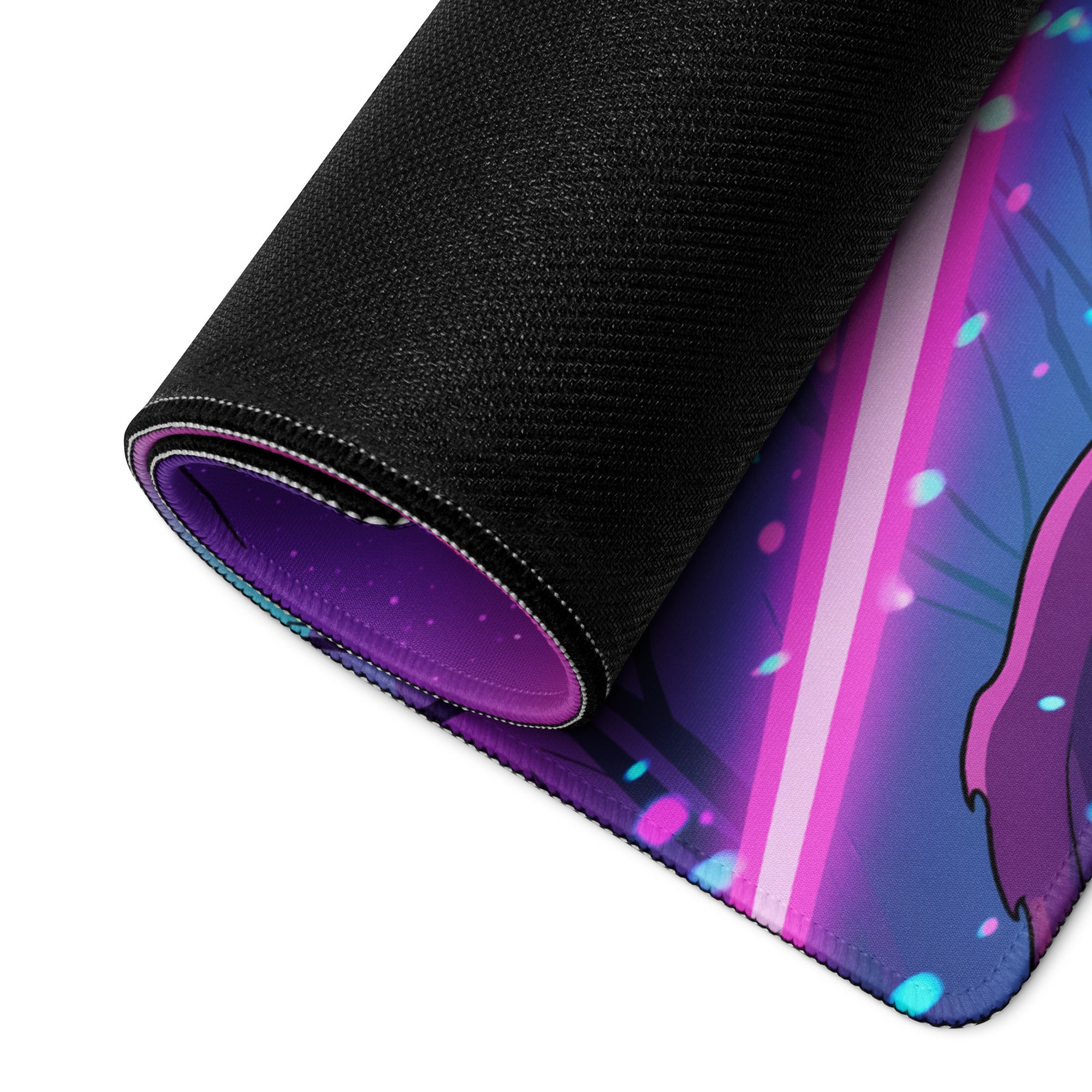 Rolled-up neon vaporwave gaming mouse pad with vibrant cosmic design in purple pink and teal for gaming desks