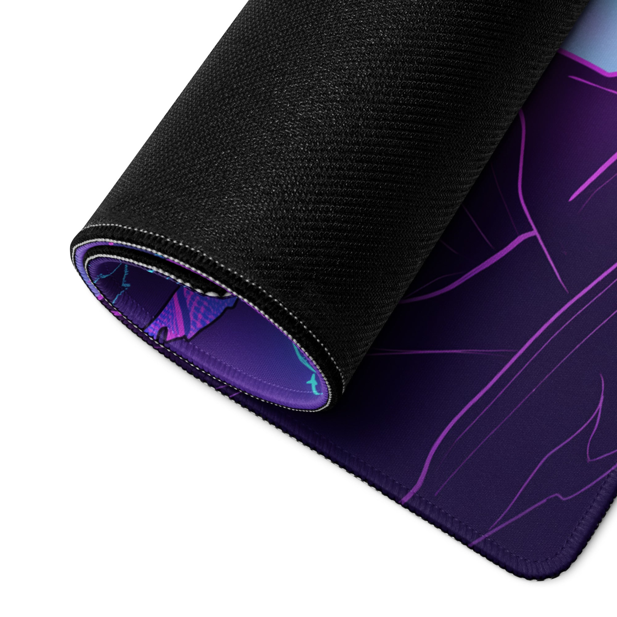 A rolled-up black gaming mousepad with a vibrant purple and blue vaporwave anime-style design surface