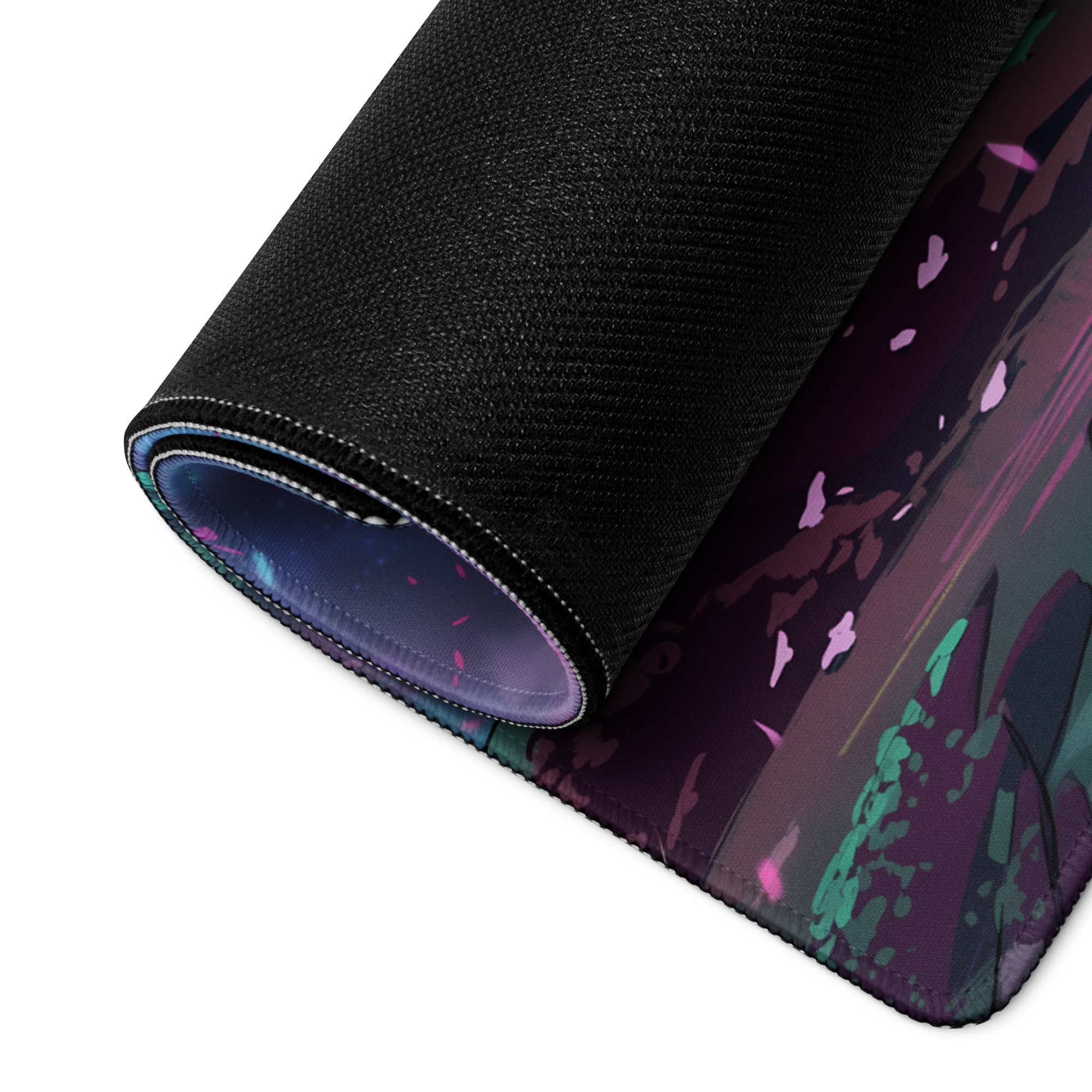 A rolled-up black vaporwave neon sakura mouse pad with vibrant purple pink and teal abstract splashes for gaming desks