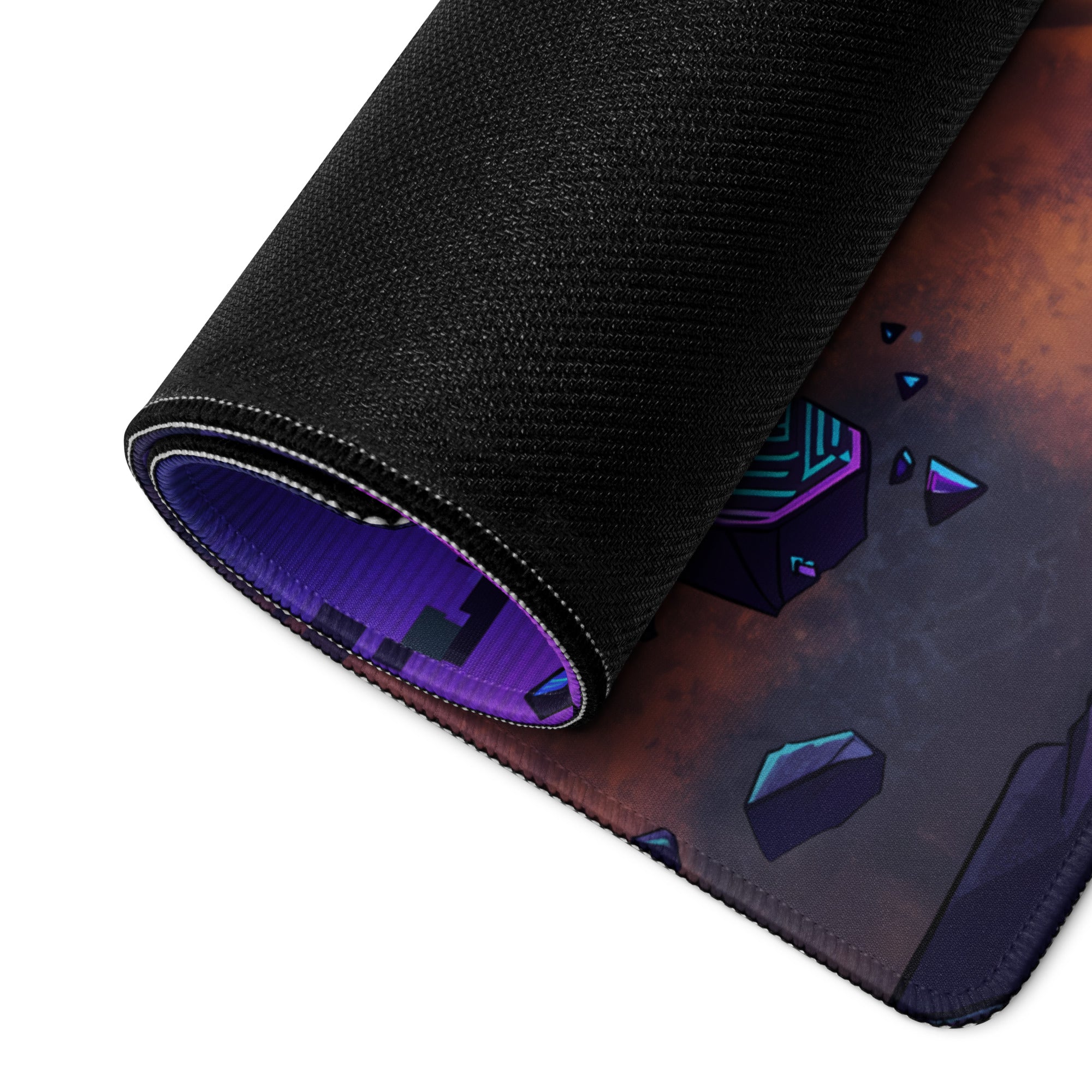Black and purple gaming mouse pad with futuristic geometric design and glowing blue neon accents for esports setup
