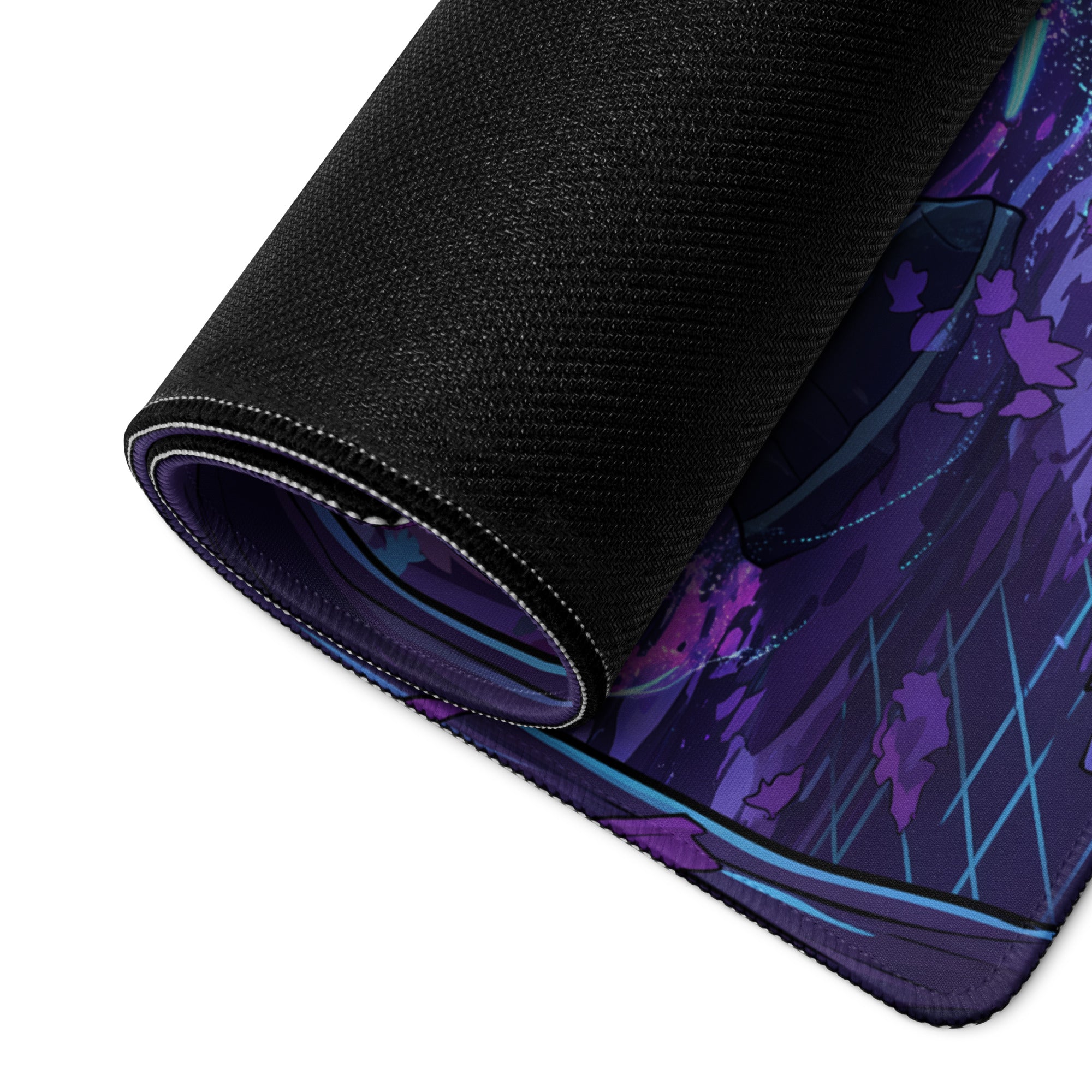 A rolled-up black neon forest dragon pad featuring vibrant purple and blue anime floral patterns gaming mousepad