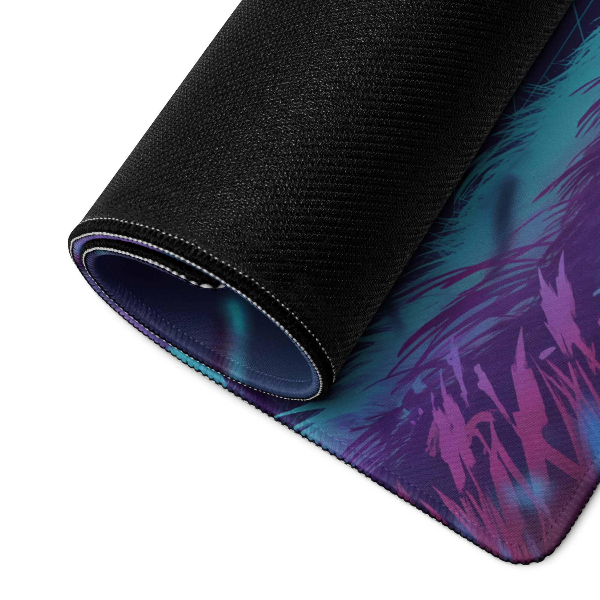 A rolled-up neon vaporwave gaming mouse pad with teal and purple abstract design on black textured surface