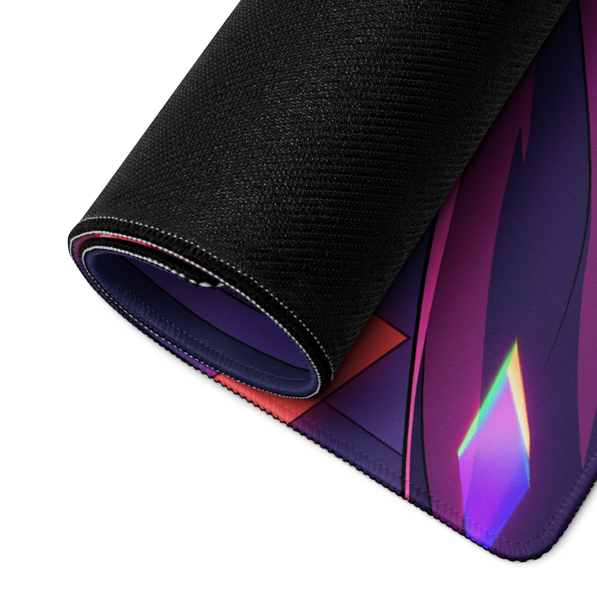 A rolled-up black gaming mousepad with a vibrant iridescent purple and pink geometric vaporwave neon design